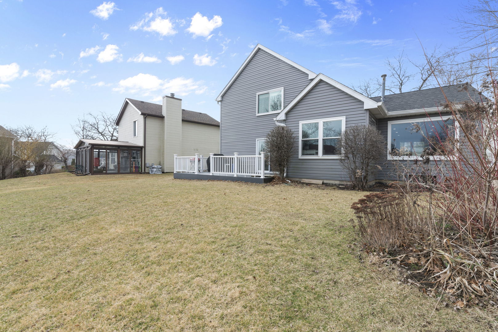 4599 Mumford Drive Hoffman Estates, IL 60192 - Photo 24 of 25 a view of a house with a yard and large tree