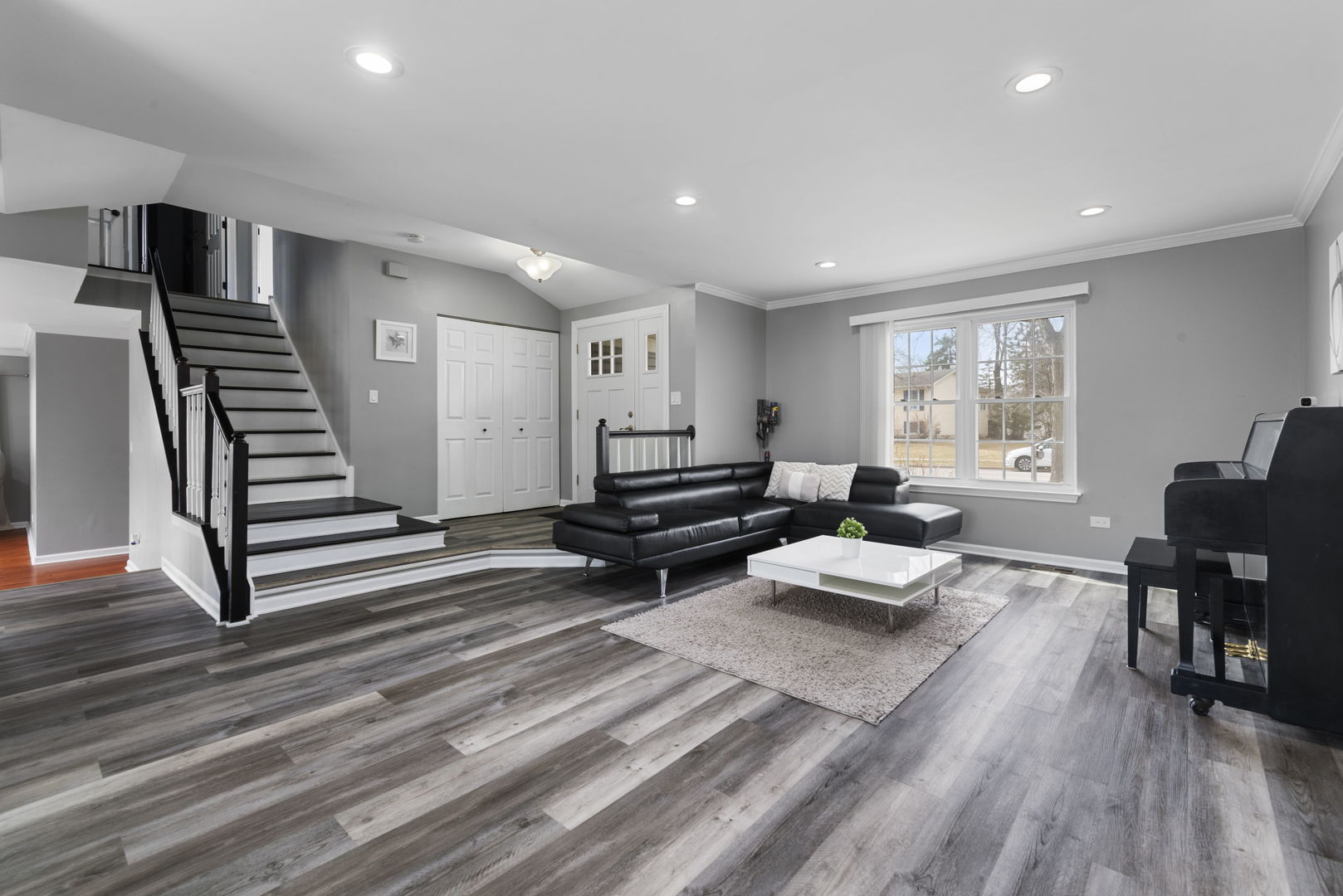 4599 Mumford Drive Hoffman Estates, IL 60192 - Photo 4 of 25 a living room with furniture and wooden floor