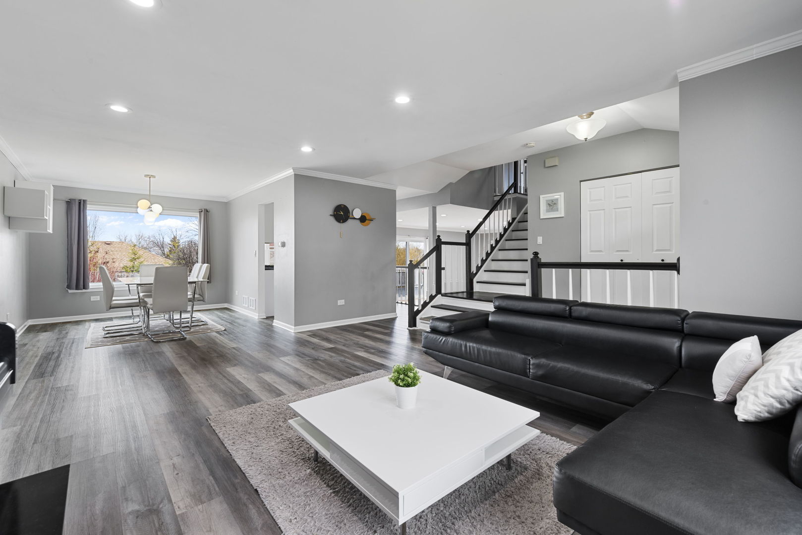 4599 Mumford Drive Hoffman Estates, IL 60192 - Photo 7 of 25 a living room with furniture and wooden floor