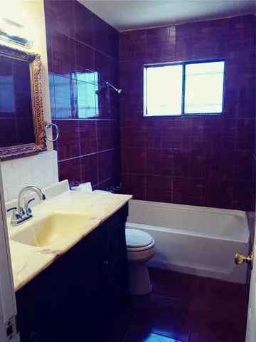 a bathroom with a sink and a bathtub