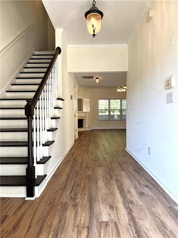 2075 Pine Tree Drive Buford, GA 30518 - Photo 2 of 18 a view of an entryway with wooden floor