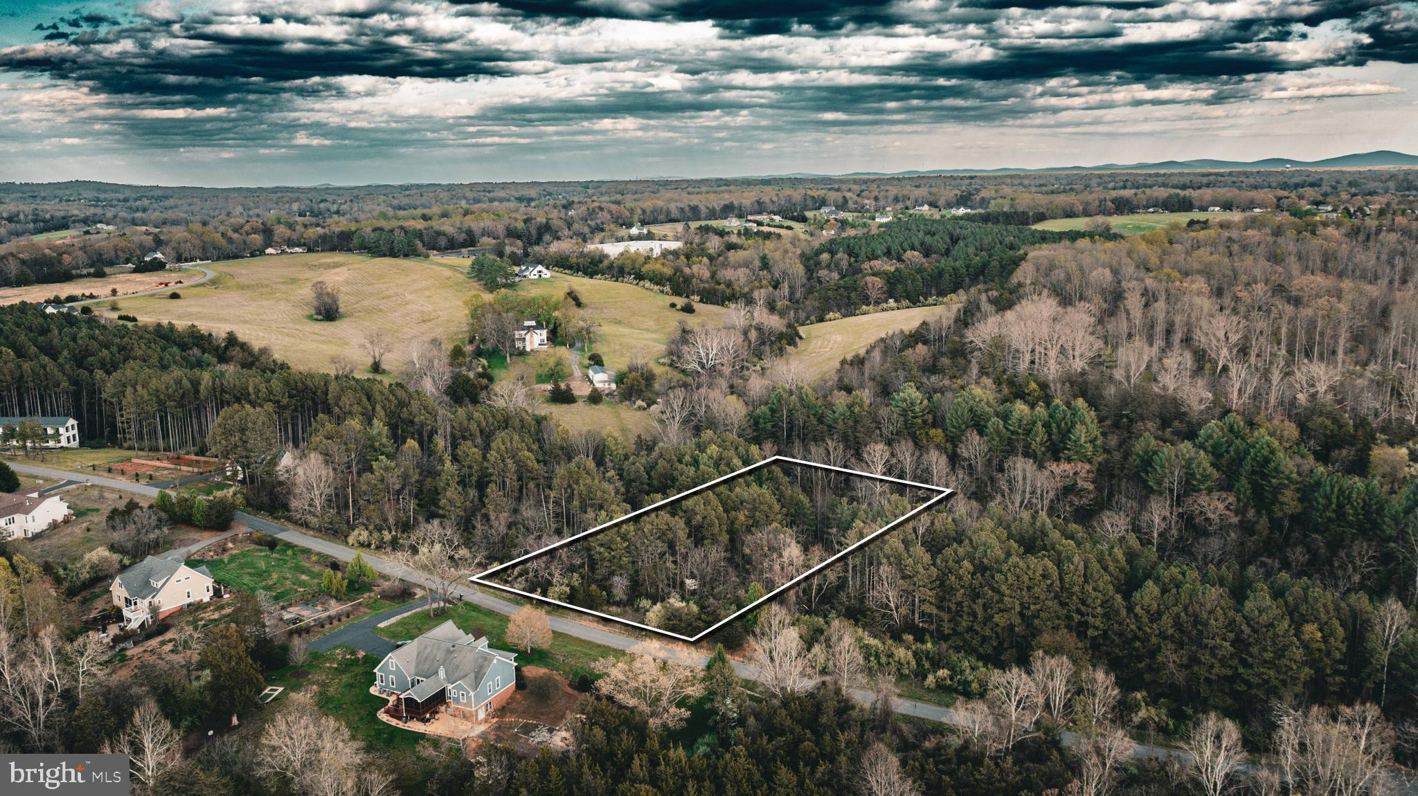 Tbd Ridgeview Drive Ruckersville, VA 22968 - Photo 11 of 27 a view of a lake with a mountain