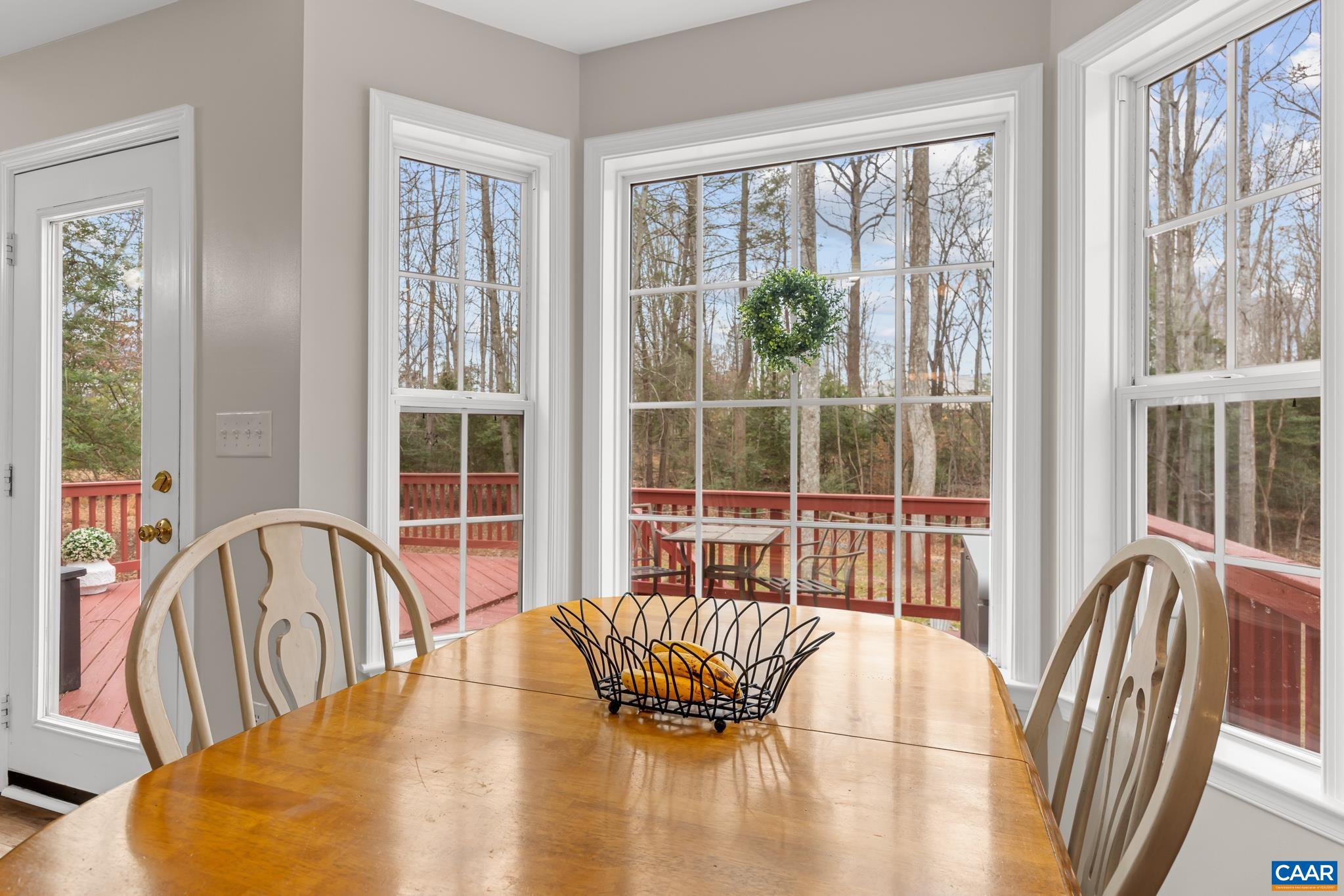 334 Carodon Drive Ruckersville, VA 22968 - Photo 22 of 54 a view of a dining room with furniture window and outside view