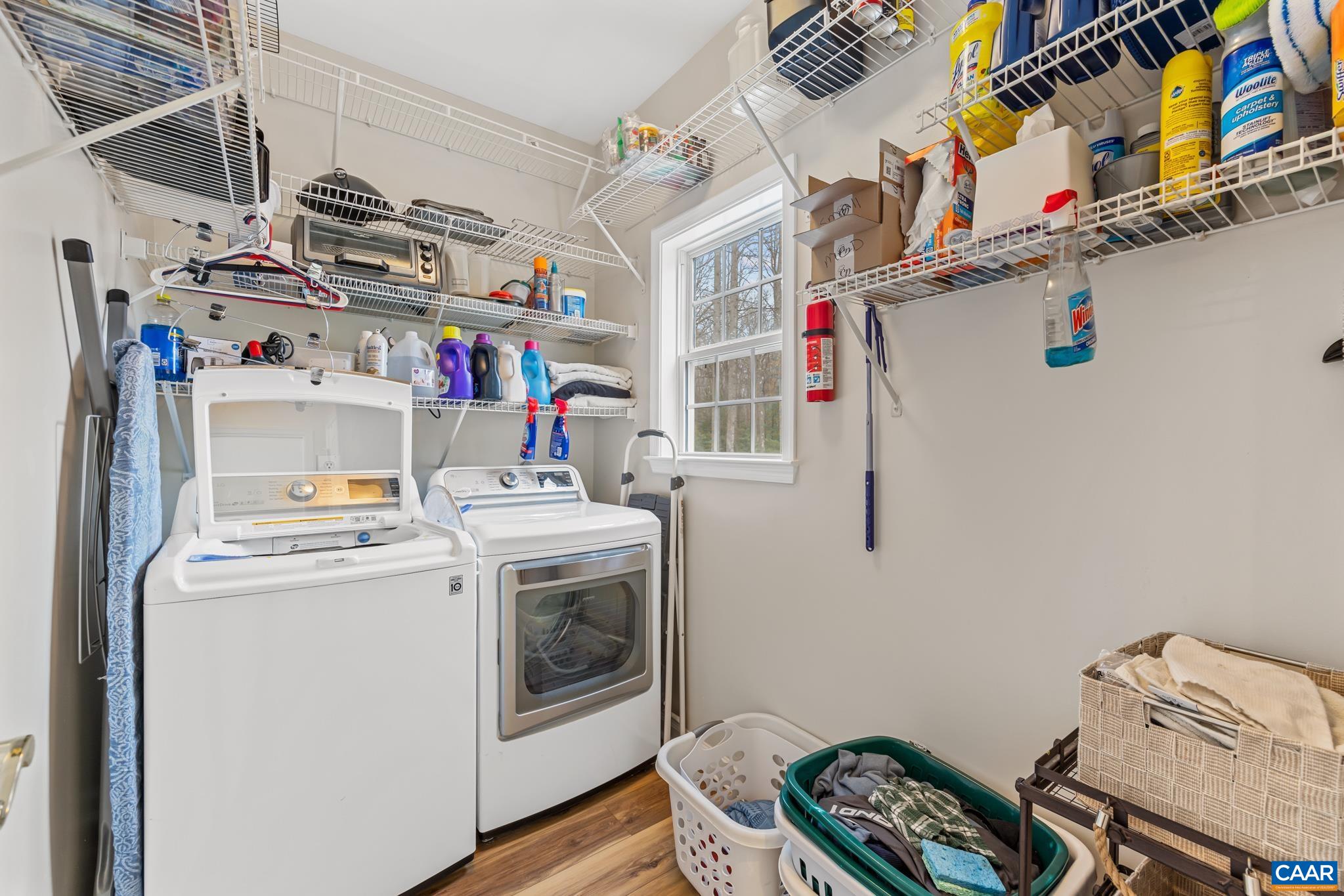 334 Carodon Drive Ruckersville, VA 22968 - Photo 25 of 54 a utility room with dryer and washer