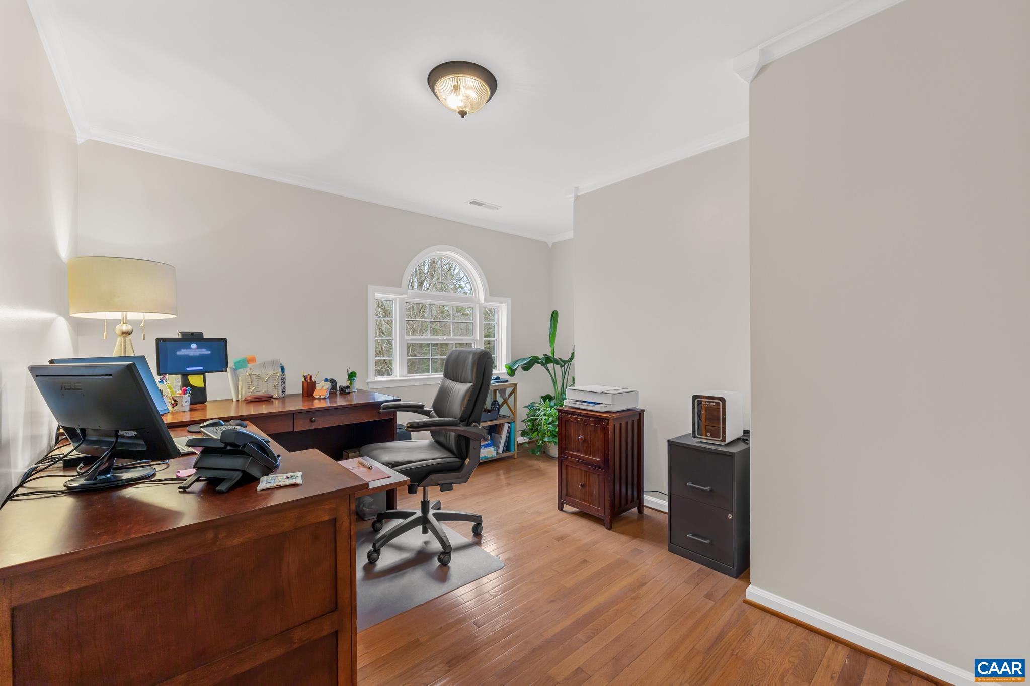 334 Carodon Drive Ruckersville, VA 22968 - Photo 27 of 54 a living room with furniture and a wooden floor