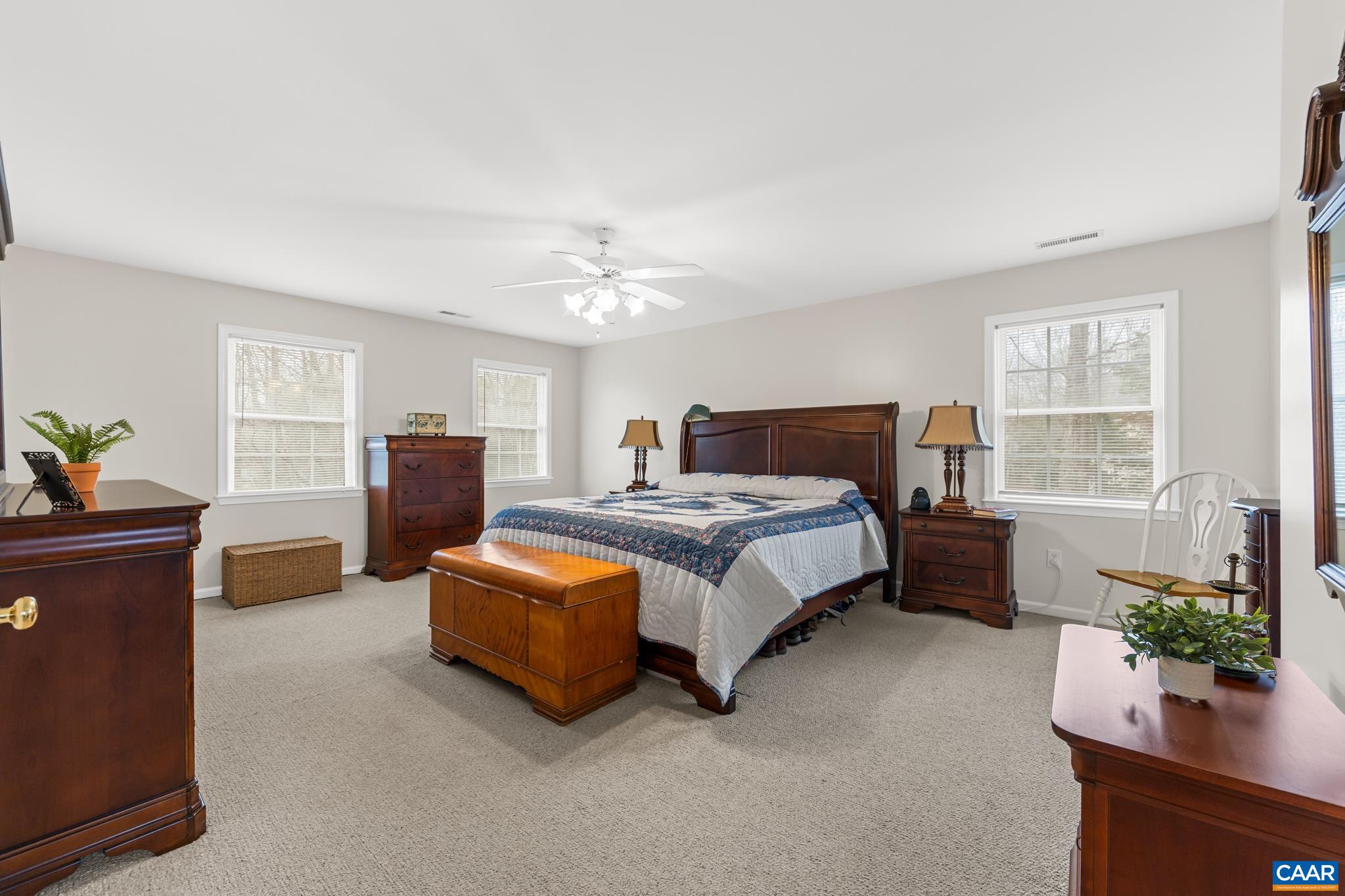 334 Carodon Drive Ruckersville, VA 22968 - Photo 28 of 54 a spacious bedroom with a bed and window