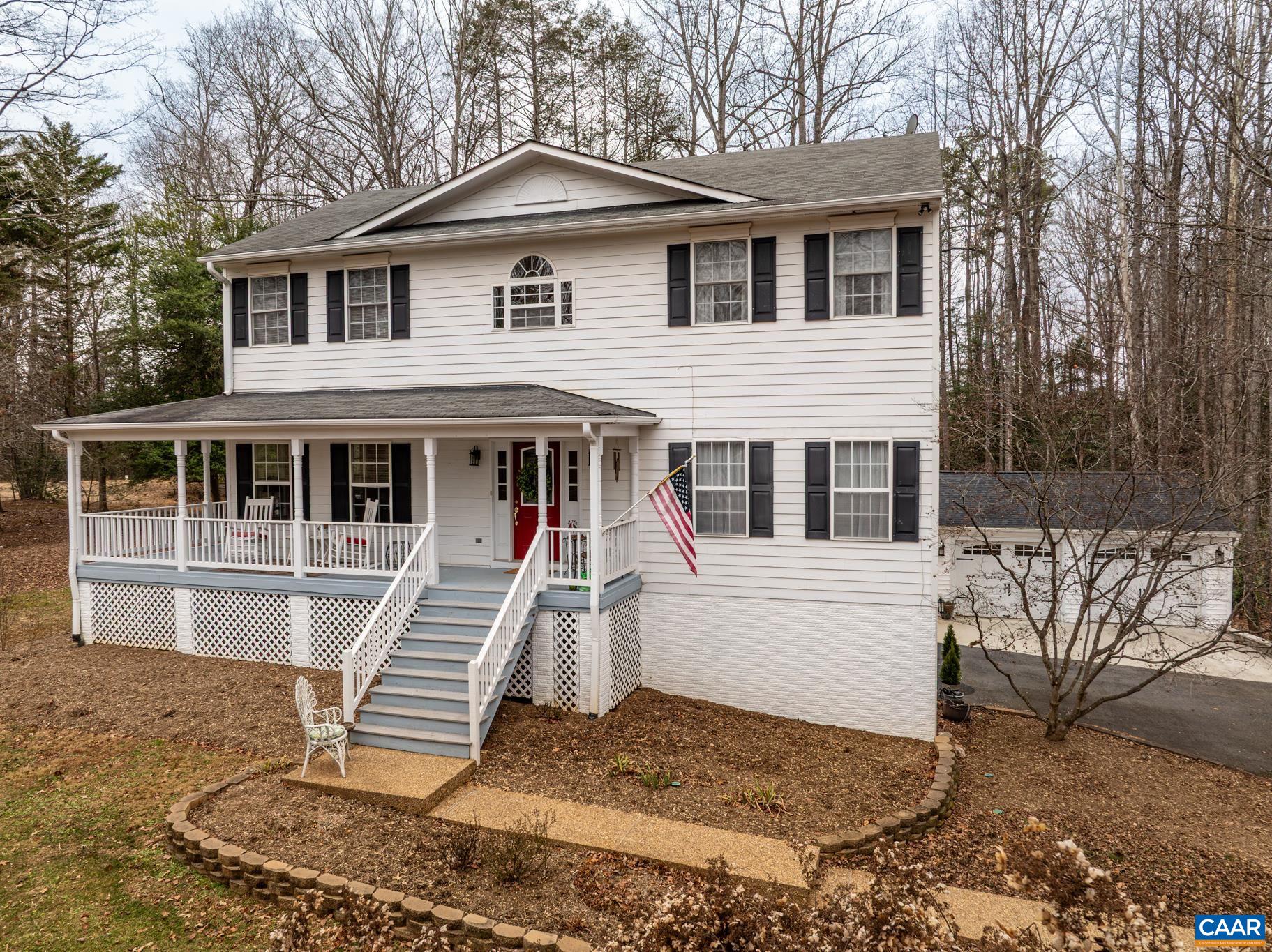 334 Carodon Drive Ruckersville, VA 22968 - Photo 4 of 54 a front view of a house with a yard