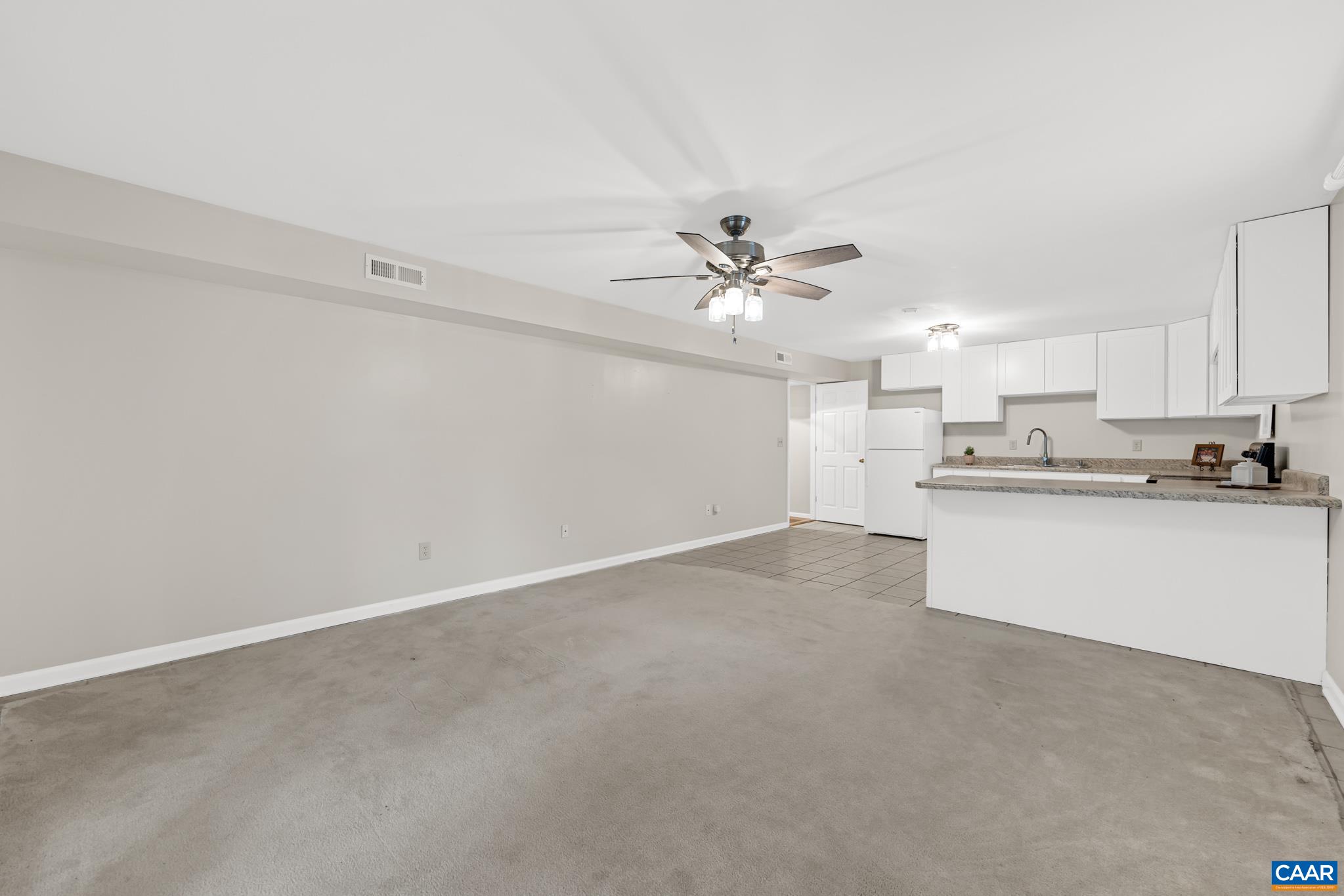 334 Carodon Drive Ruckersville, VA 22968 - Photo 41 of 54 a view of a kitchen with a sink and cabinets
