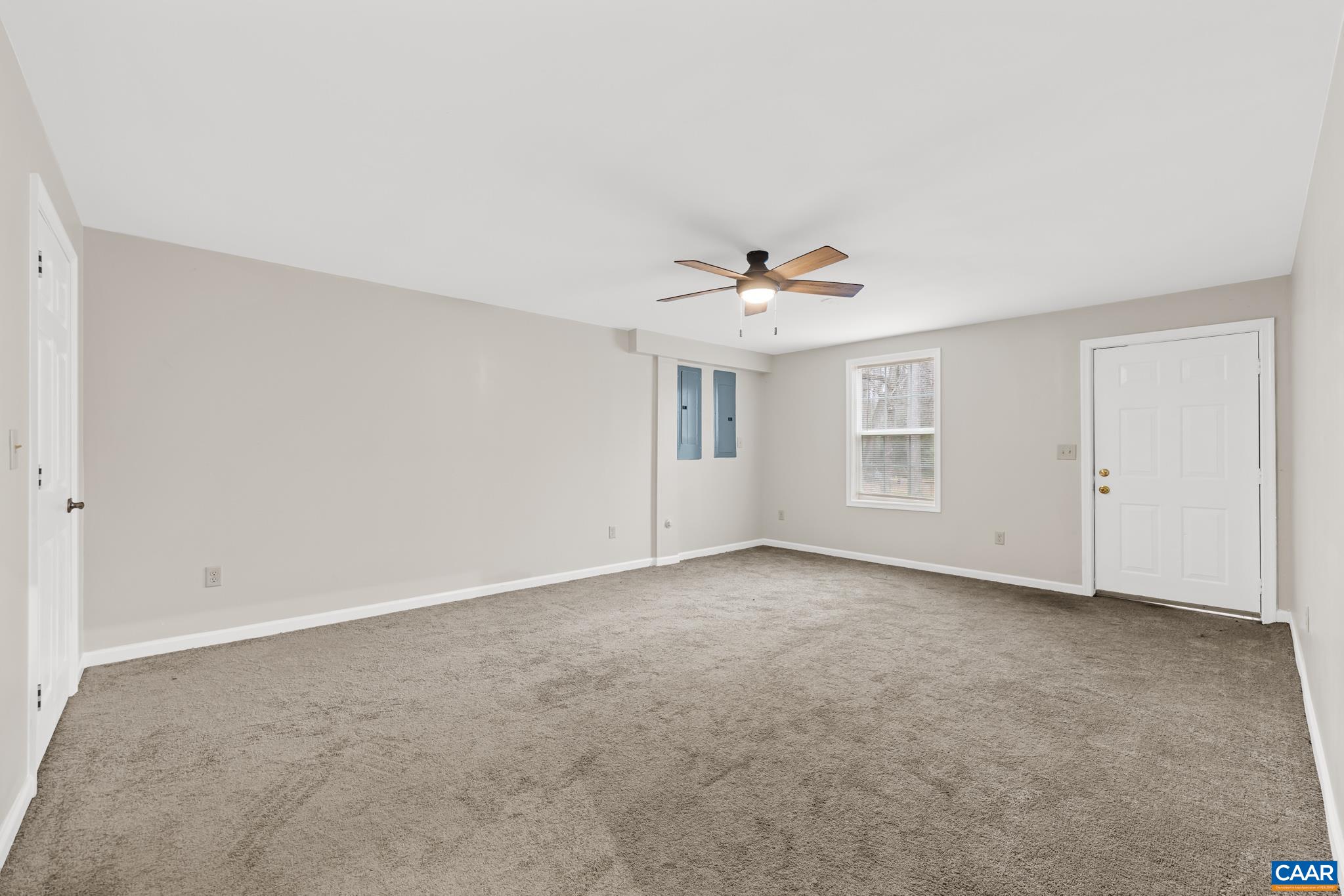 334 Carodon Drive Ruckersville, VA 22968 - Photo 43 of 54 a view of an empty room with chandelier fan