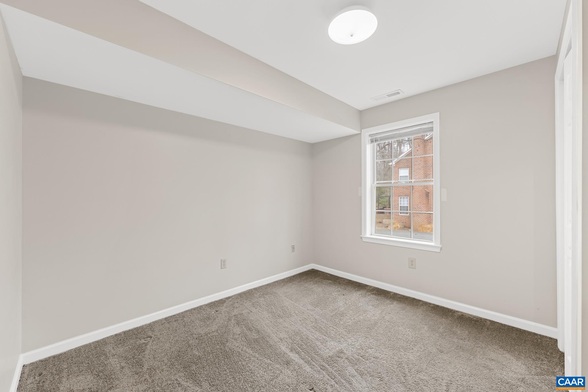 334 Carodon Drive Ruckersville, VA 22968 - Photo 48 of 54 an empty room with a window