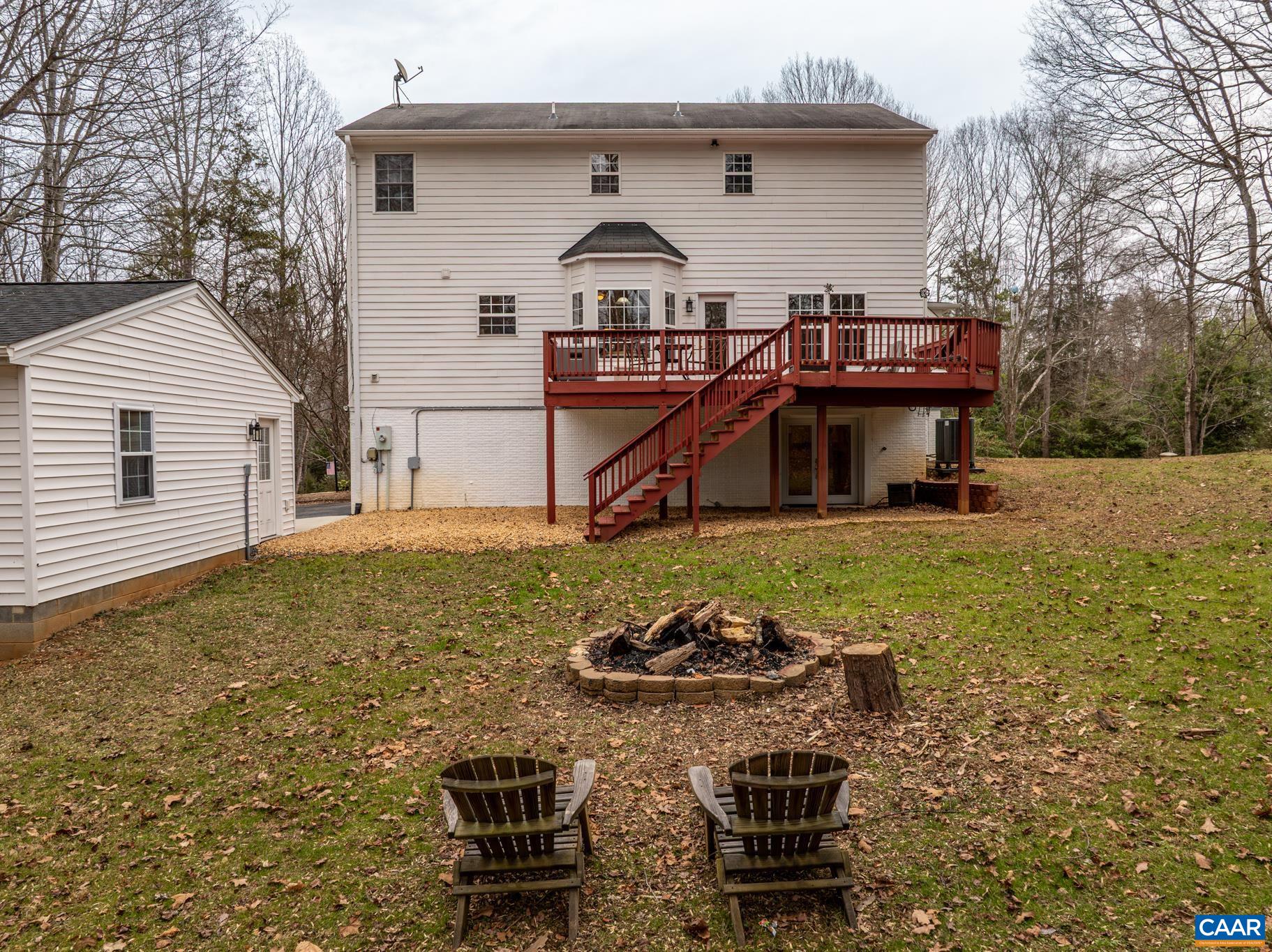334 Carodon Drive Ruckersville, VA 22968 - Photo 50 of 54 a front view of a house with garden