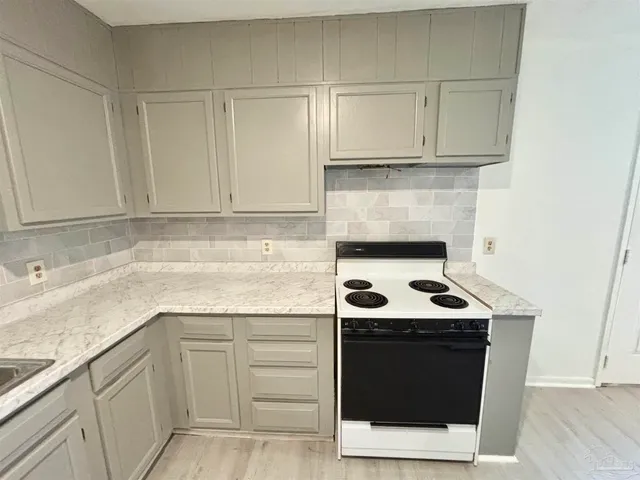 a view of a room with wooden walls