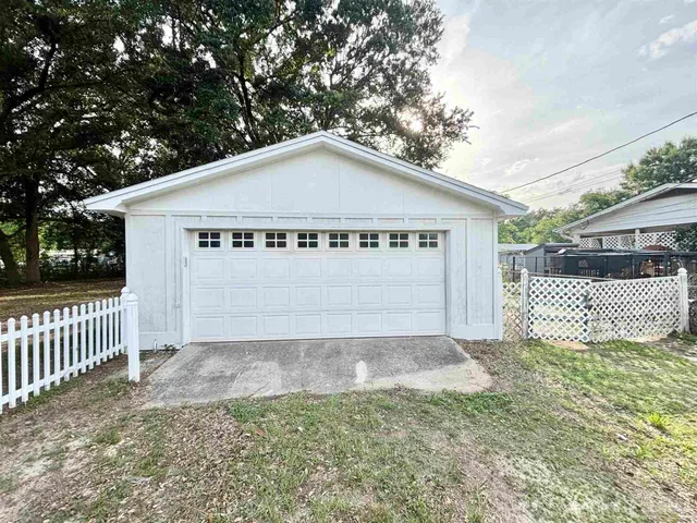 a view of a house with a swimming pool