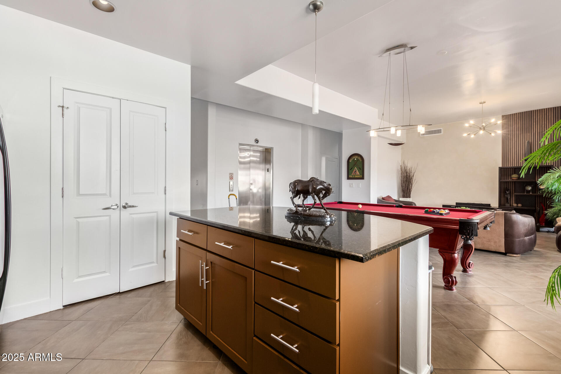 945 East Playa Del Norte Drive, Unit 3004 Tempe, AZ 85288 - Photo 11 of 41 a kitchen with a sink and cabinets