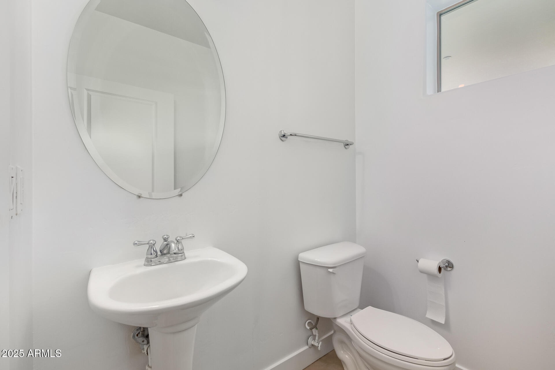 945 East Playa Del Norte Drive, Unit 3004 Tempe, AZ 85288 - Photo 12 of 41 a bathroom with a sink a mirror and a toilet