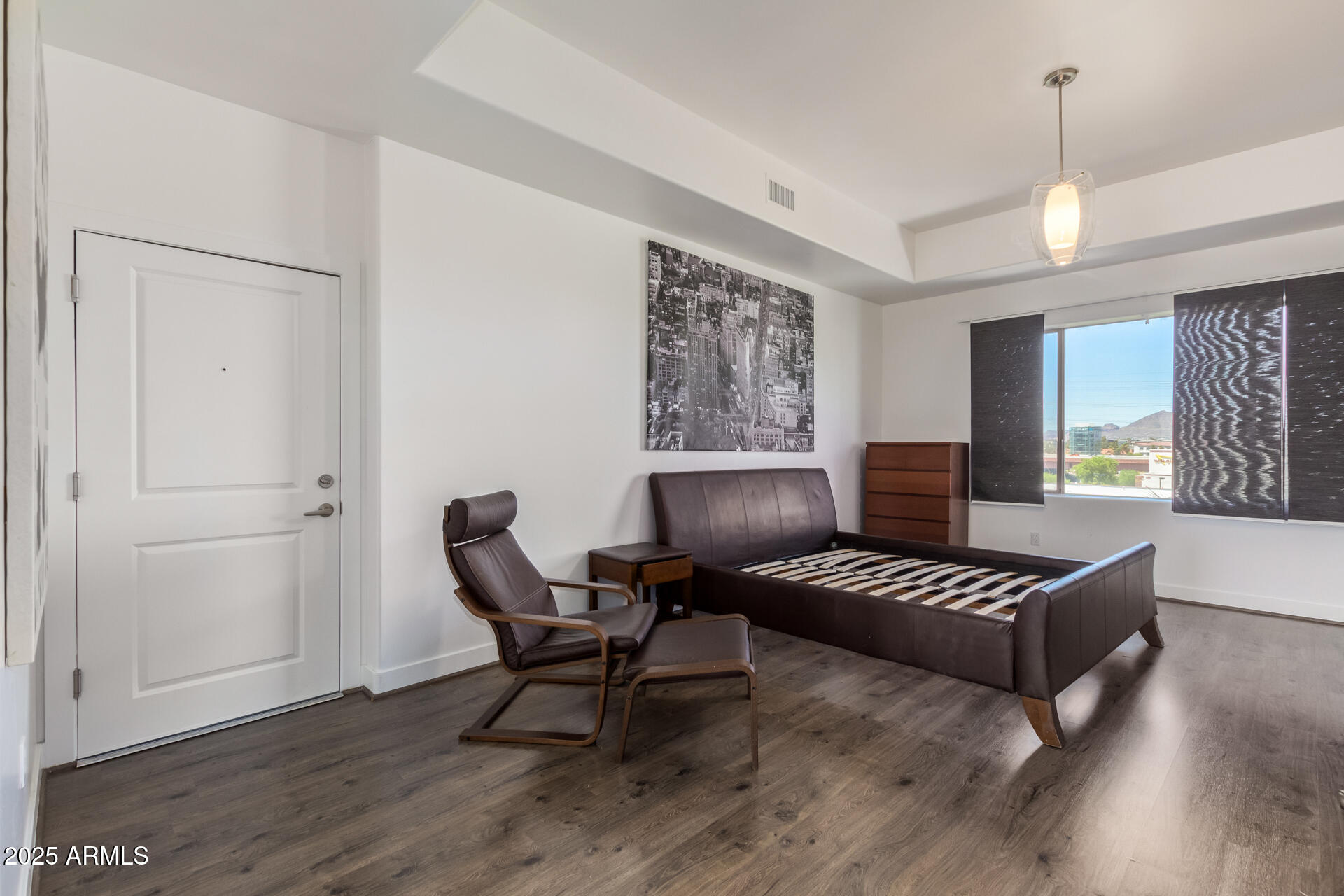 945 East Playa Del Norte Drive, Unit 3004 Tempe, AZ 85288 - Photo 13 of 41 a living room with furniture and a wooden floor