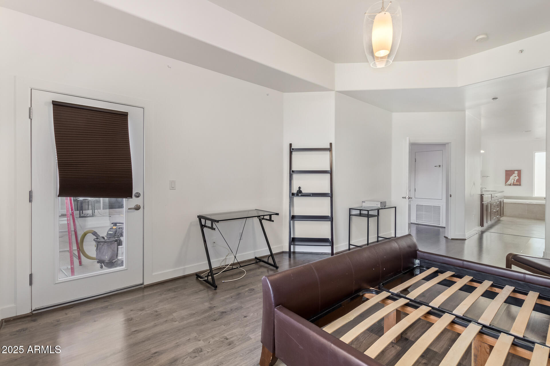 945 East Playa Del Norte Drive, Unit 3004 Tempe, AZ 85288 - Photo 14 of 41 a living room with furniture and a flat screen tv