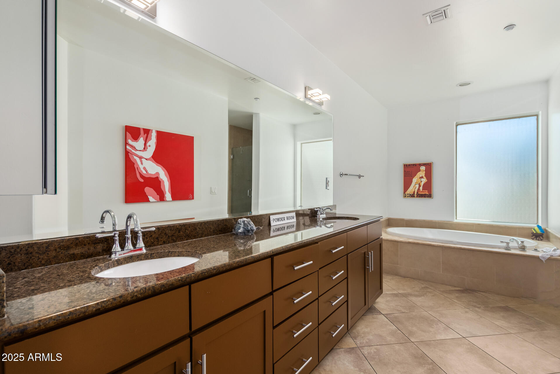 945 East Playa Del Norte Drive, Unit 3004 Tempe, AZ 85288 - Photo 15 of 41 a bathroom with a granite countertop double vanity sink and mirror