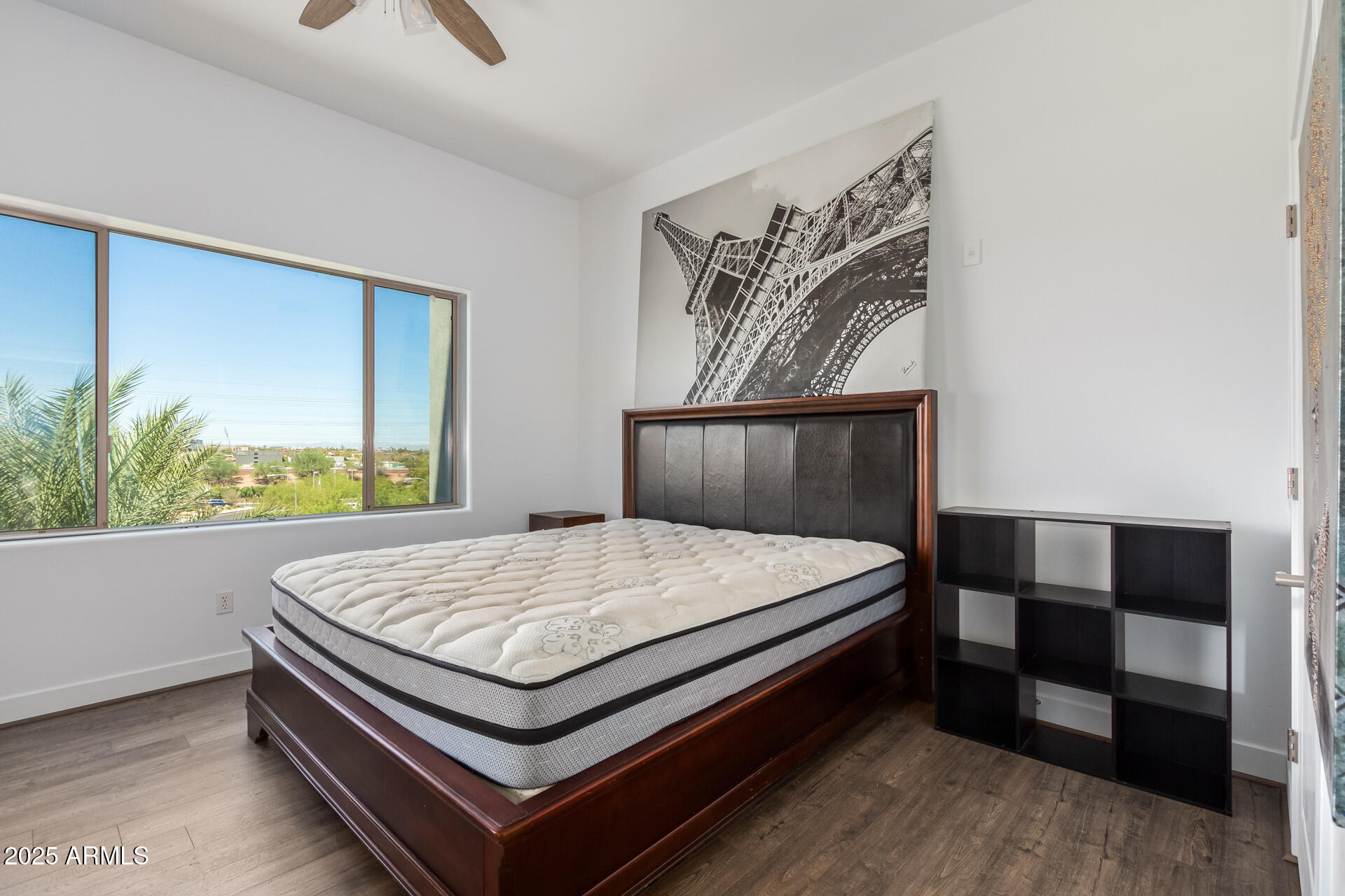 945 East Playa Del Norte Drive, Unit 3004 Tempe, AZ 85288 - Photo 17 of 41 a bed sitting in a bedroom next to a window