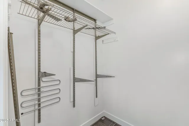 a view of a room with racks on the wall