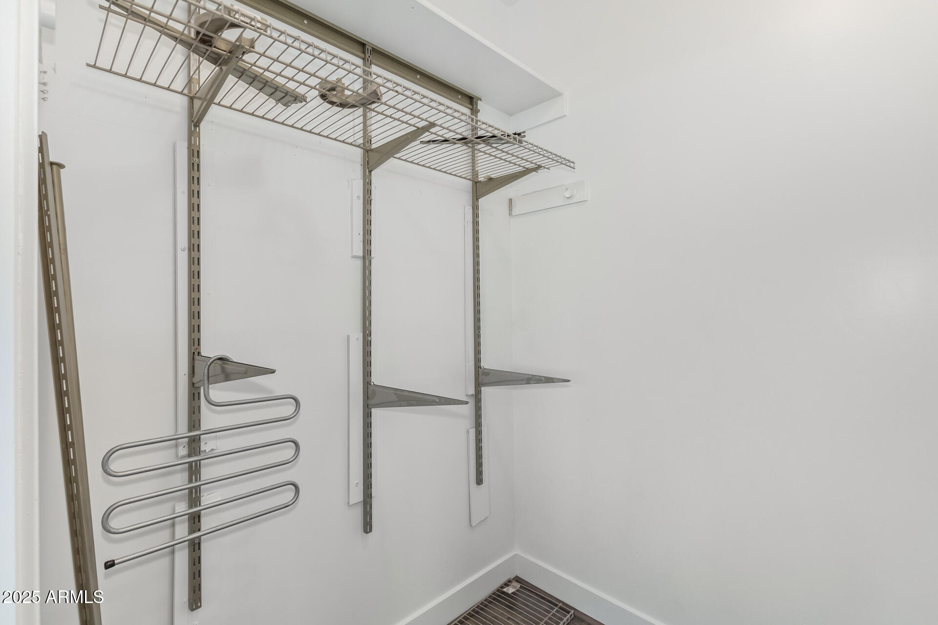 945 East Playa Del Norte Drive, Unit 3004 Tempe, AZ 85288 - Photo 19 of 41 a view of a room with racks on the wall