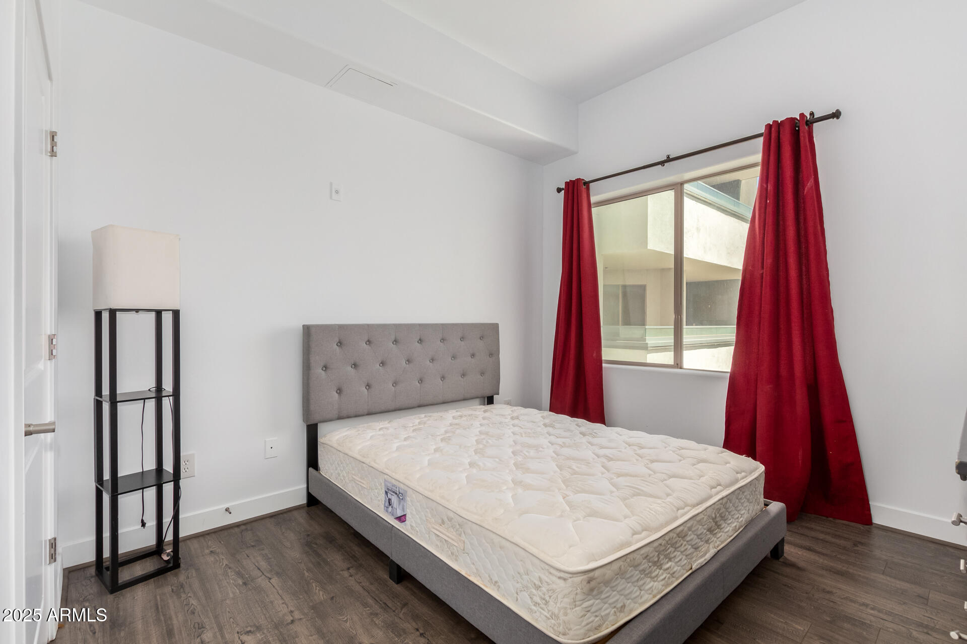 945 East Playa Del Norte Drive, Unit 3004 Tempe, AZ 85288 - Photo 20 of 41 a bed sitting in a bedroom next to a window