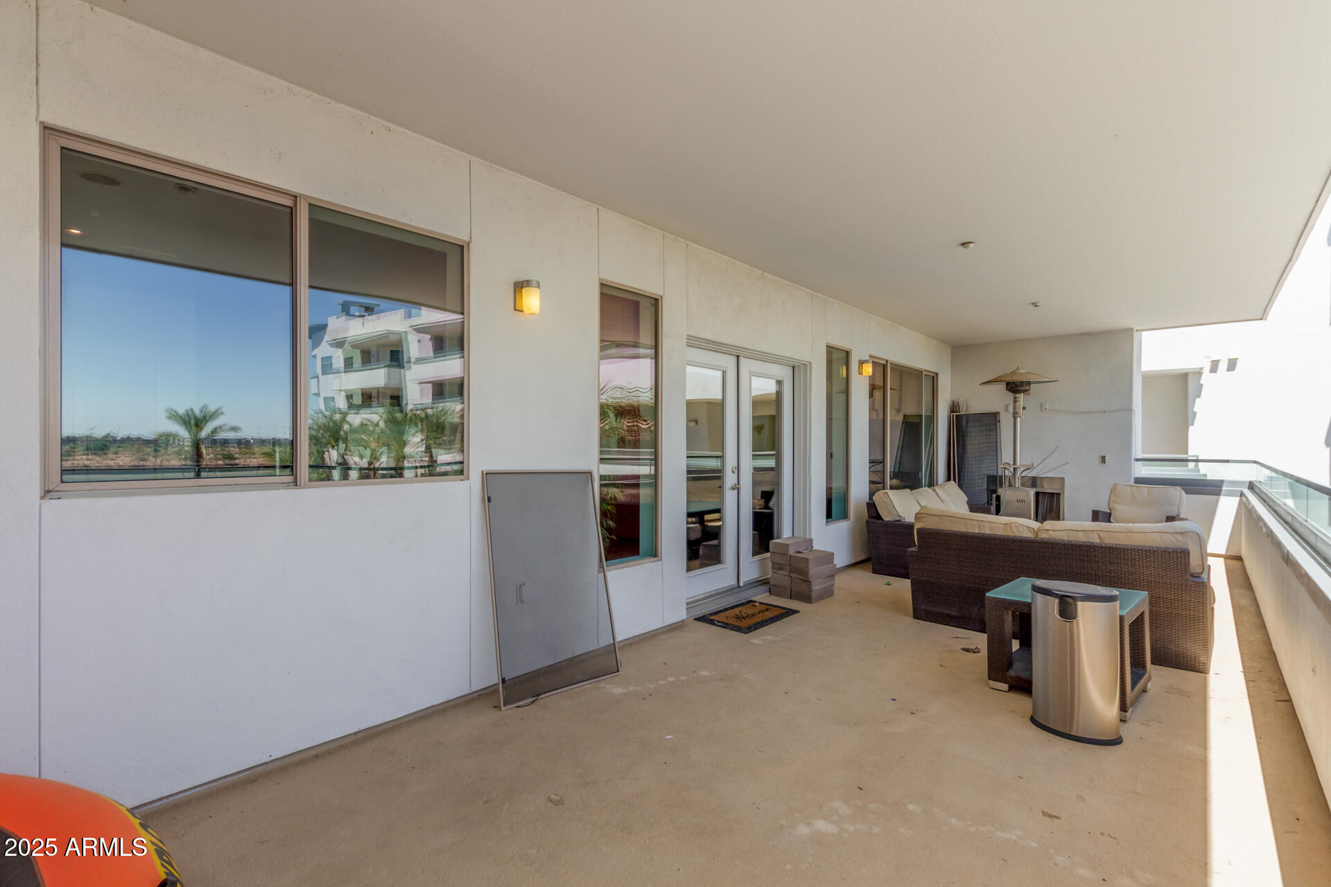 945 East Playa Del Norte Drive, Unit 3004 Tempe, AZ 85288 - Photo 25 of 41 a room with gym equipment and a large window