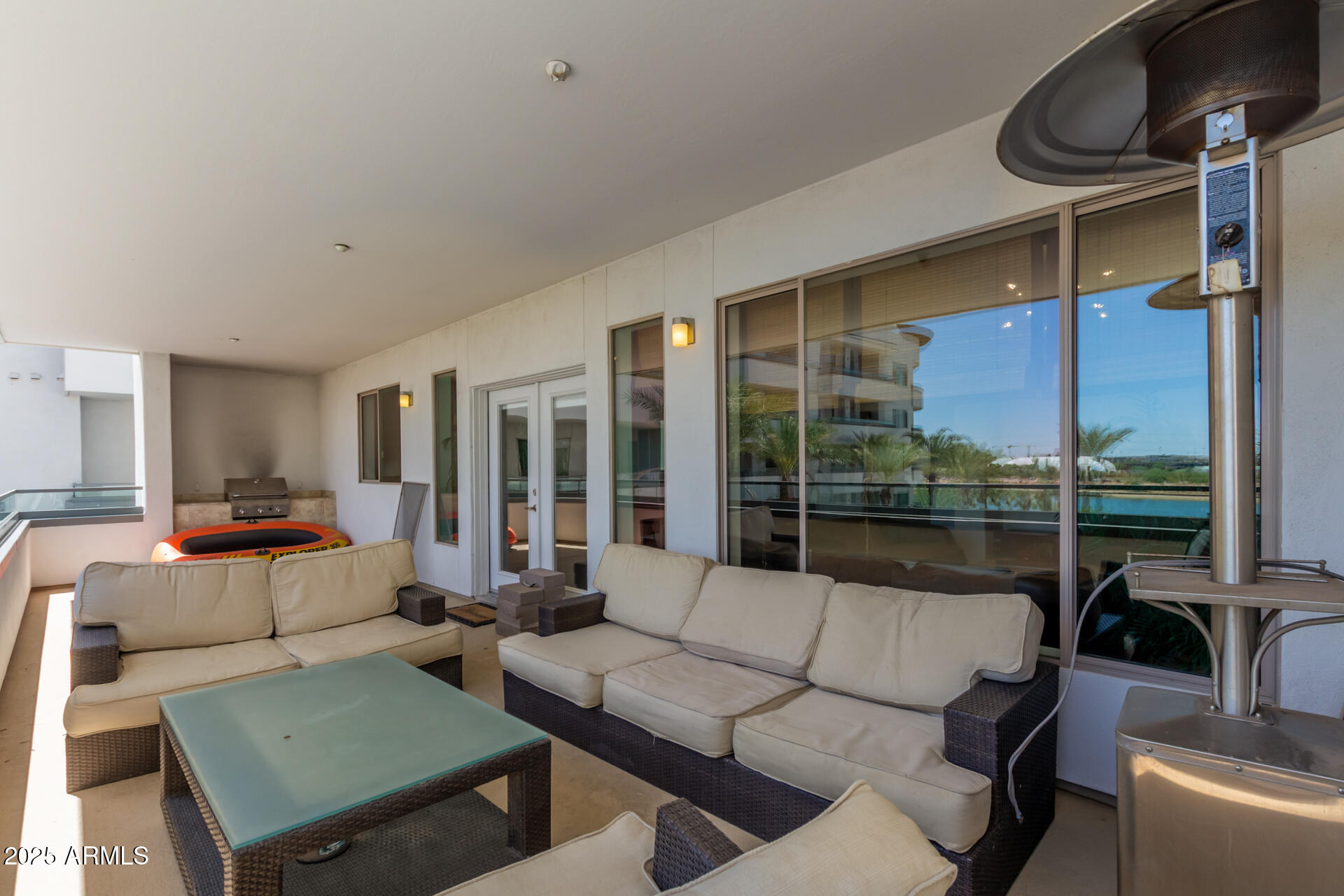 945 East Playa Del Norte Drive, Unit 3004 Tempe, AZ 85288 - Photo 27 of 41 a living room with furniture and a large window