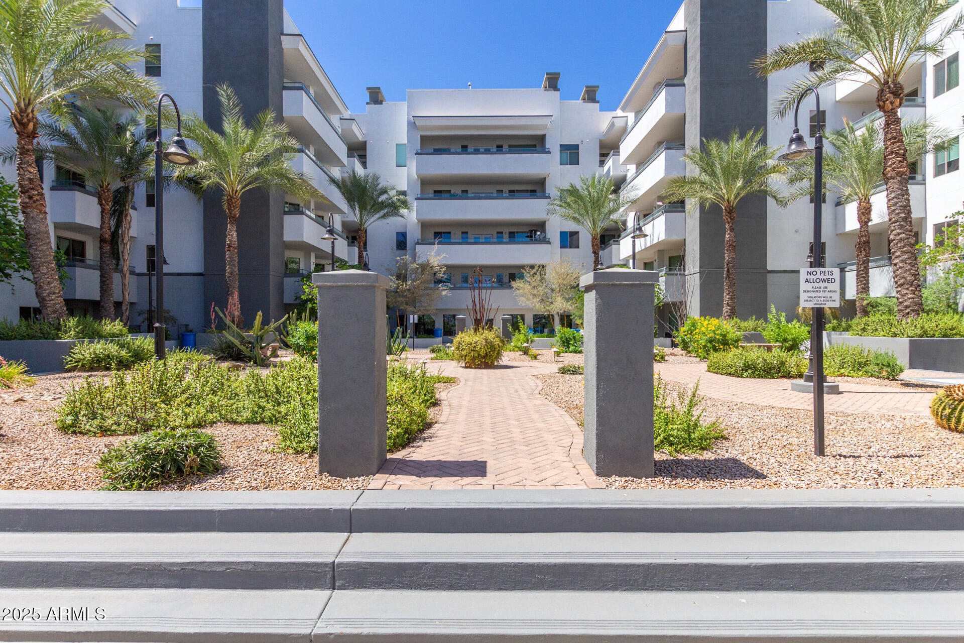 945 East Playa Del Norte Drive, Unit 3004 Tempe, AZ 85288 - Photo 35 of 41 a street view with tall buildings