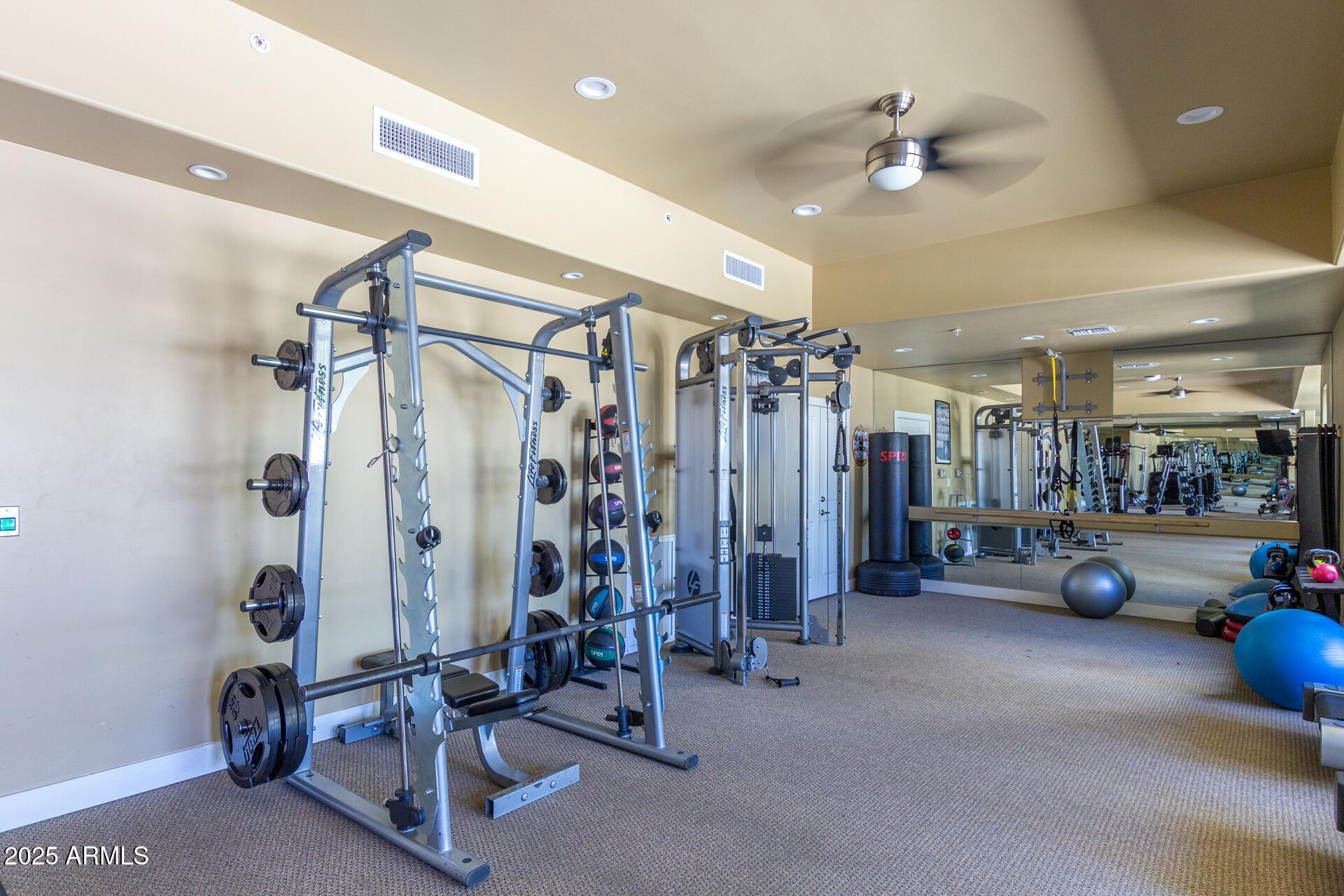 945 East Playa Del Norte Drive, Unit 3004 Tempe, AZ 85288 - Photo 37 of 41 a view of a room with gym equipment