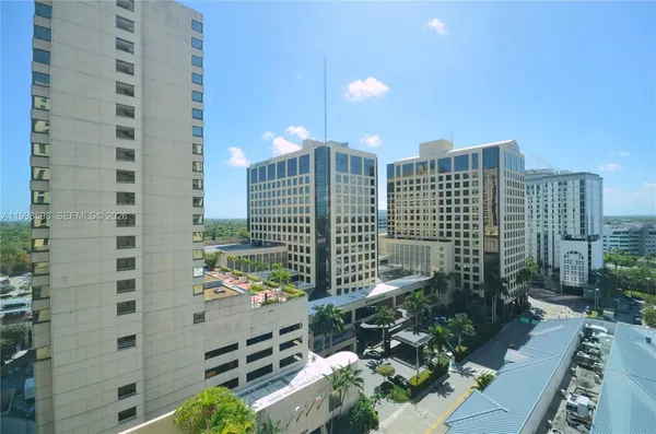 a view of a city with tall buildings
