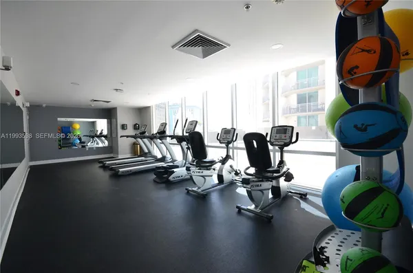 a view of a room with gym equipment