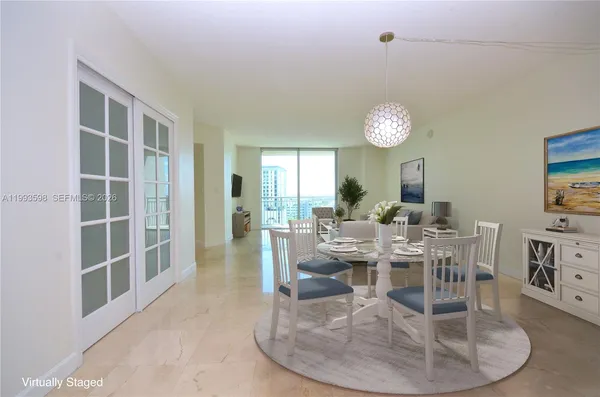 a view of a dining room with furniture