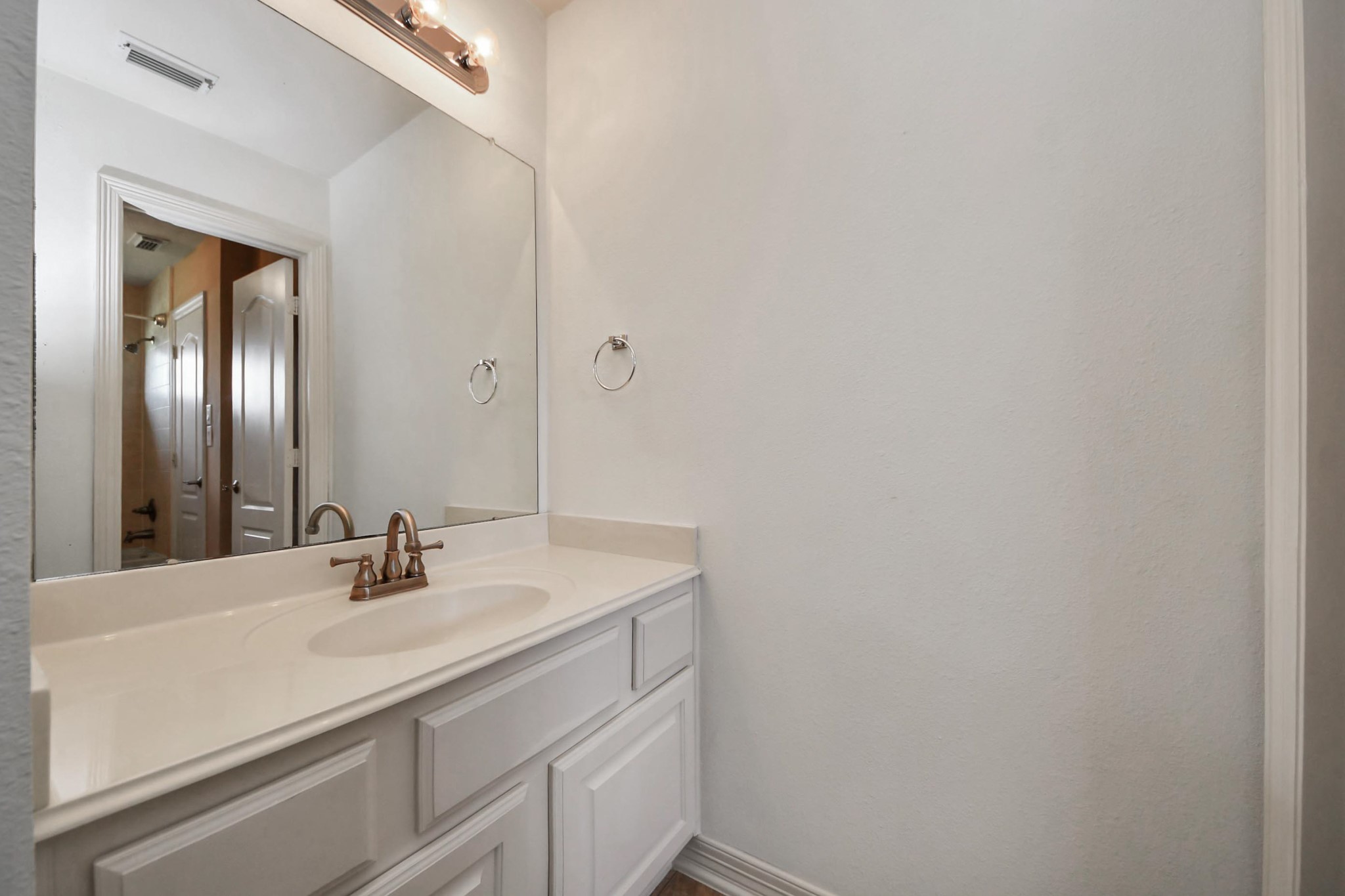 17618 Raven Canyon Lane Houston, TX 77095 - Photo 30 of 45 Functional bathroom with modern fixtures and plenty of storage, offering a bright and inviting space.
