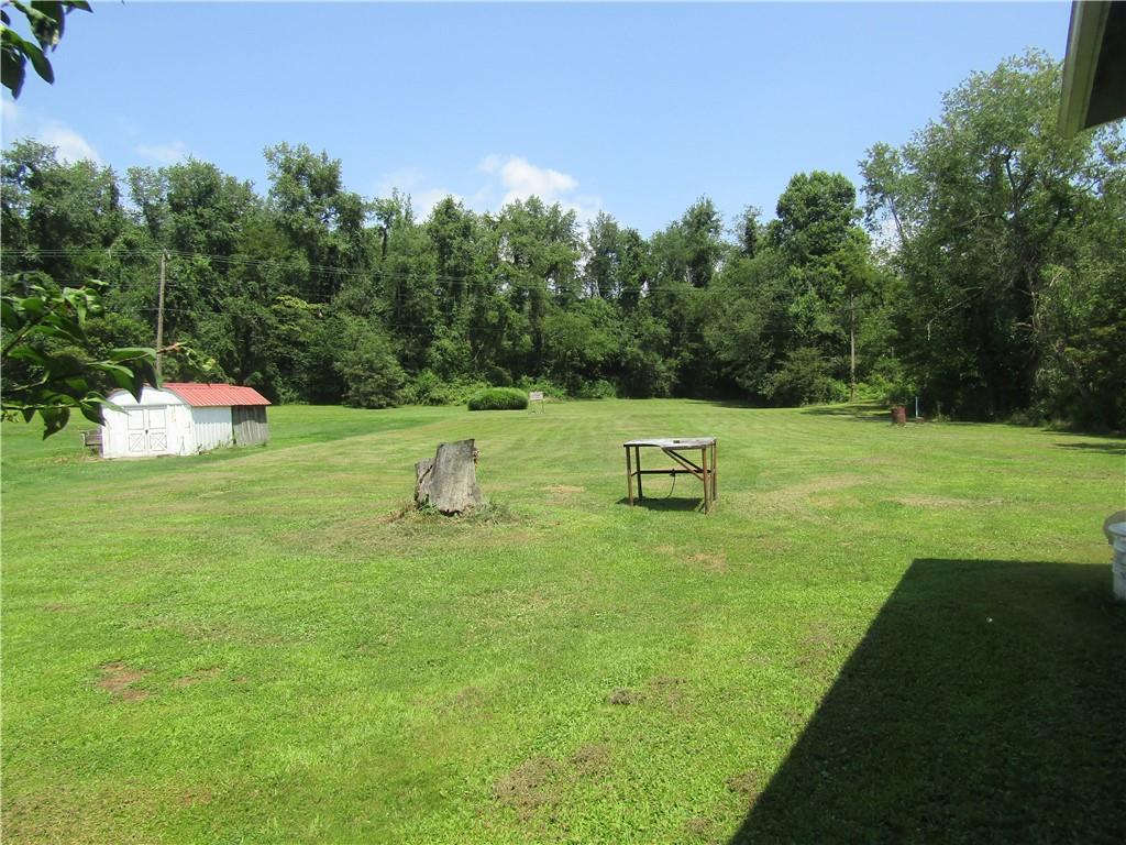 174 Juniata Road Dunbar, PA 15431 - Photo 11 of 12 a view of an house with backyard