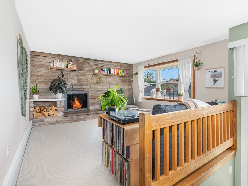 160 Mohawk Trail Cranston, RI 02921 - Photo 3 of 24 Living room with fireplace and feature wall