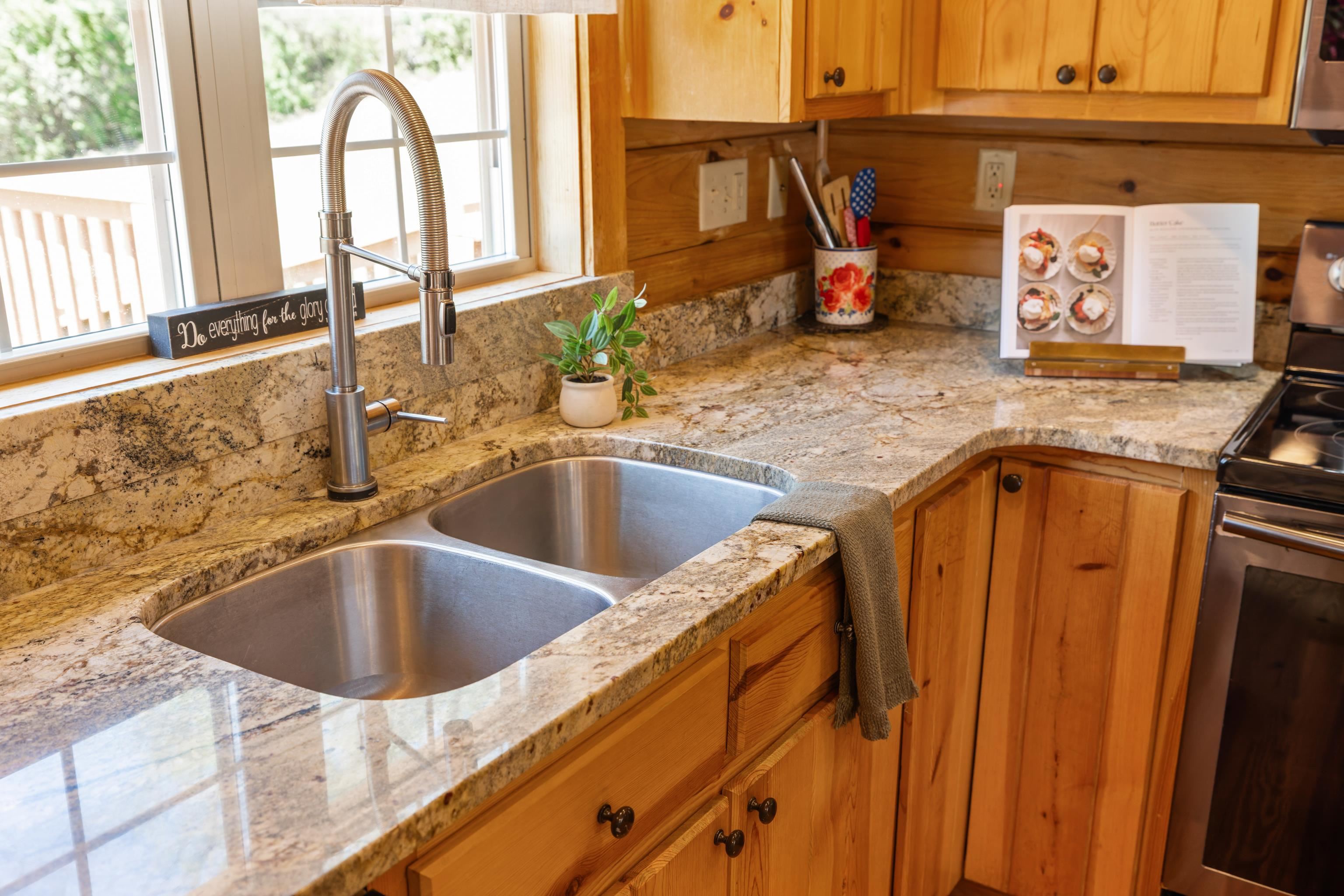 115 Spring Crossing Lane Steeles Tavern, VA 24476 - Photo 27 of 74 a kitchen with a sink and a window