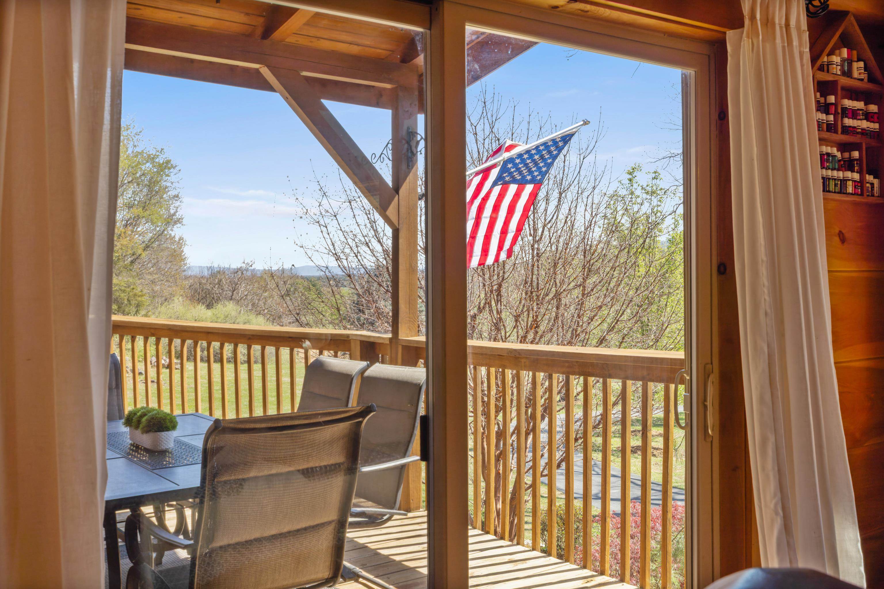 115 Spring Crossing Lane Steeles Tavern, VA 24476 - Photo 35 of 74 a view of a balcony with furniture