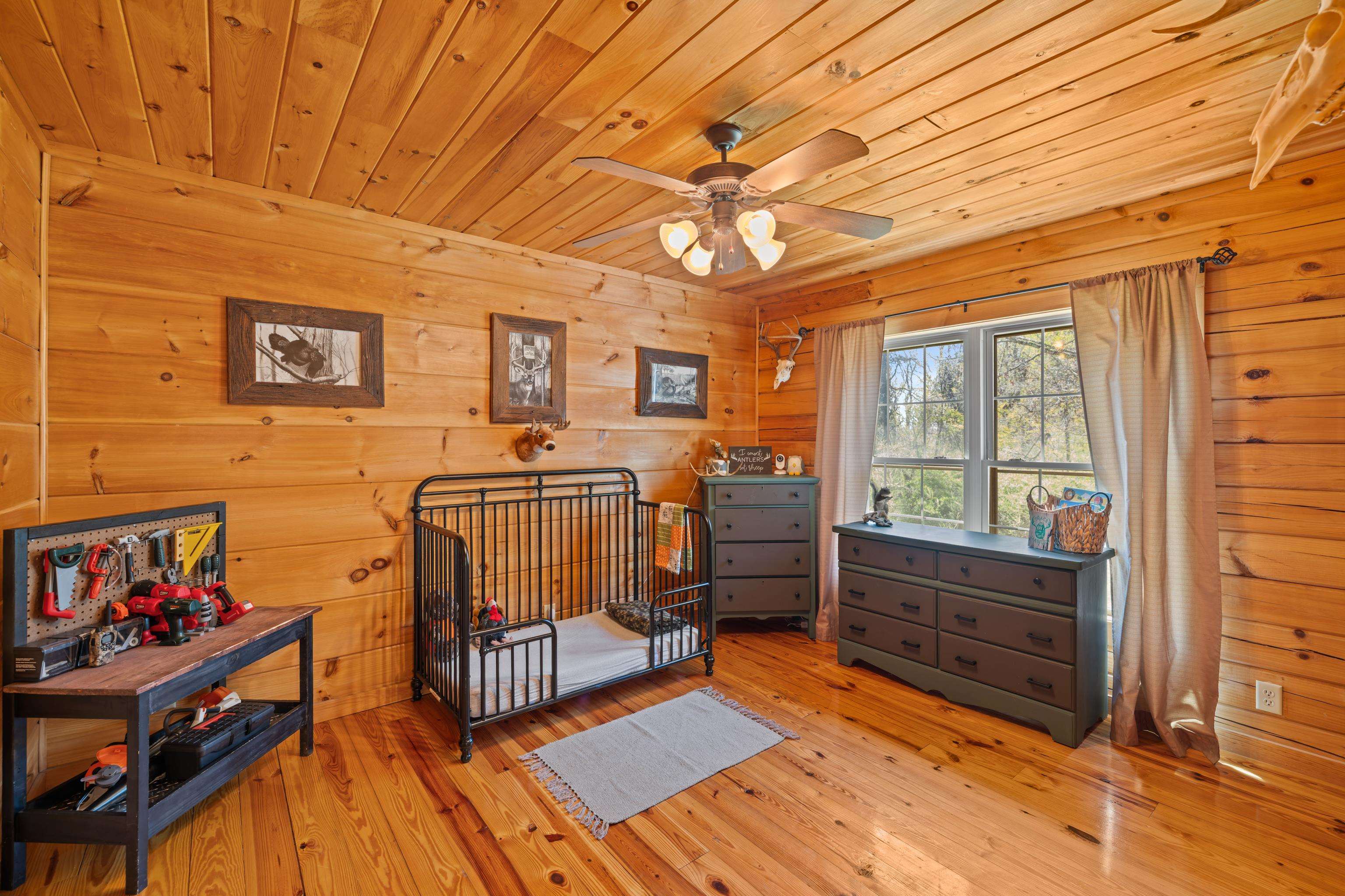 115 Spring Crossing Lane Steeles Tavern, VA 24476 - Photo 39 of 74 a view of a livingroom with furniture and staircase