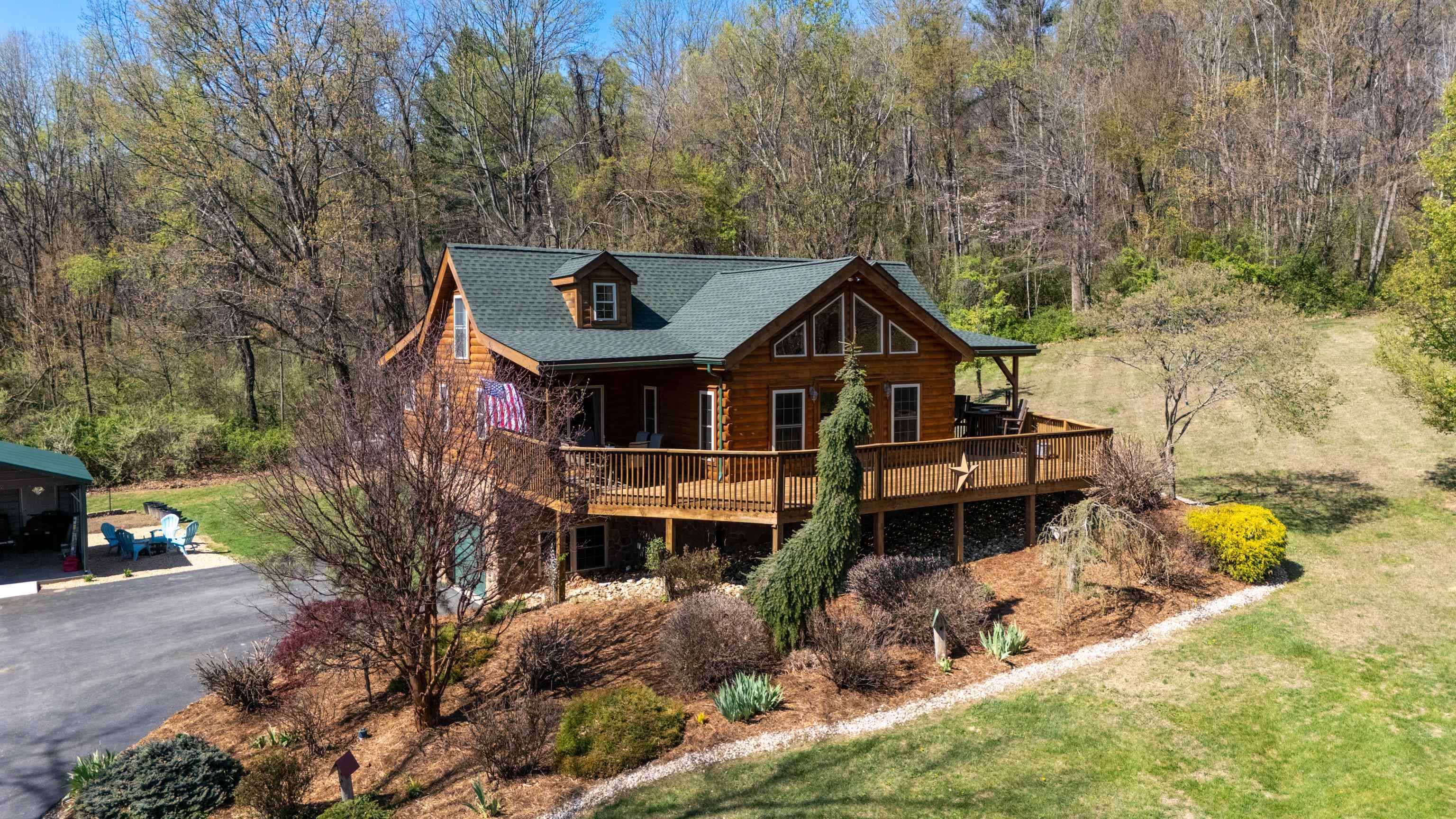 115 Spring Crossing Lane Steeles Tavern, VA 24476 - Photo 4 of 74 an aerial view of a house with a yard