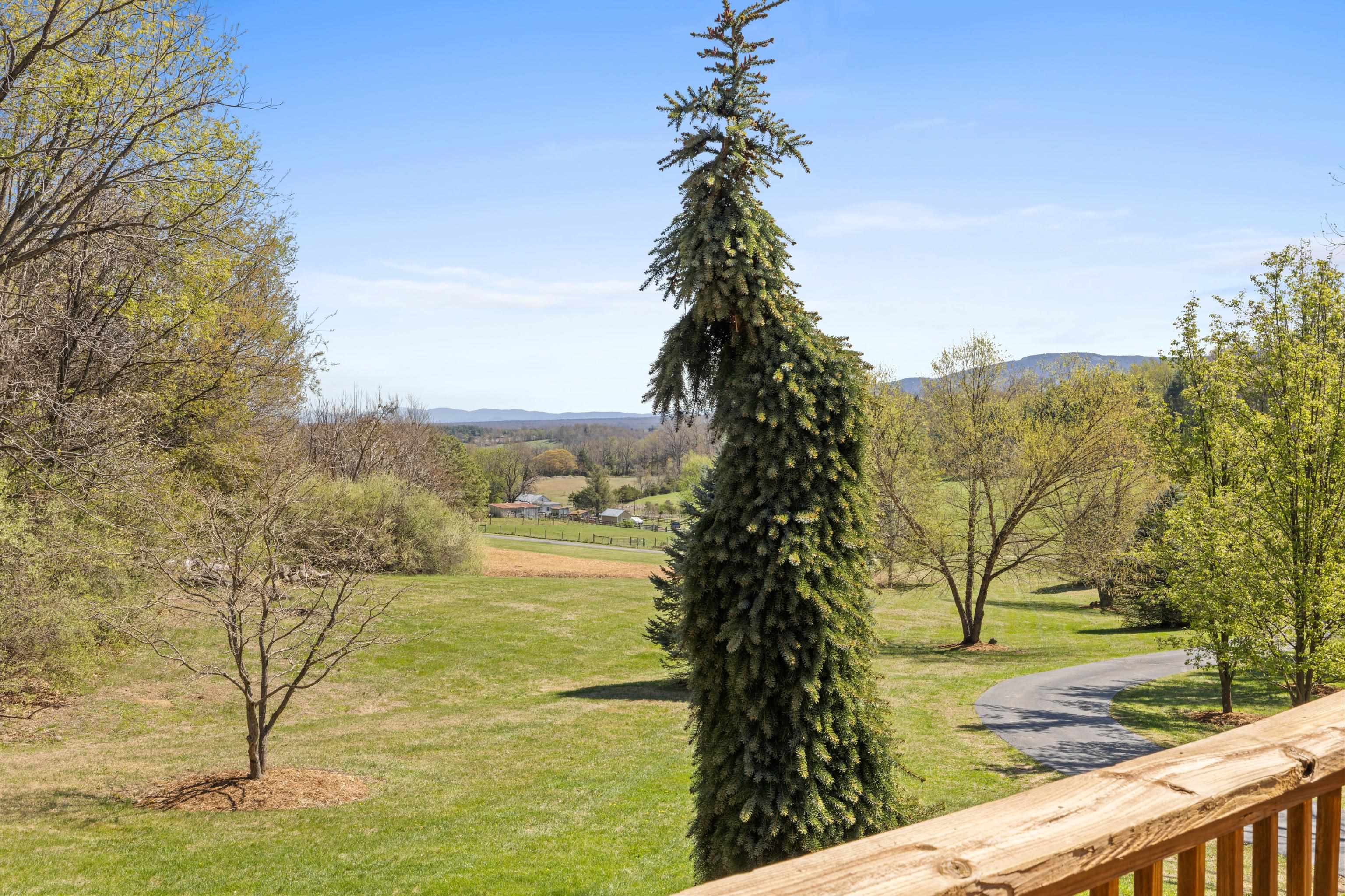 115 Spring Crossing Lane Steeles Tavern, VA 24476 - Photo 51 of 74 a view of an ocean and a mountain view