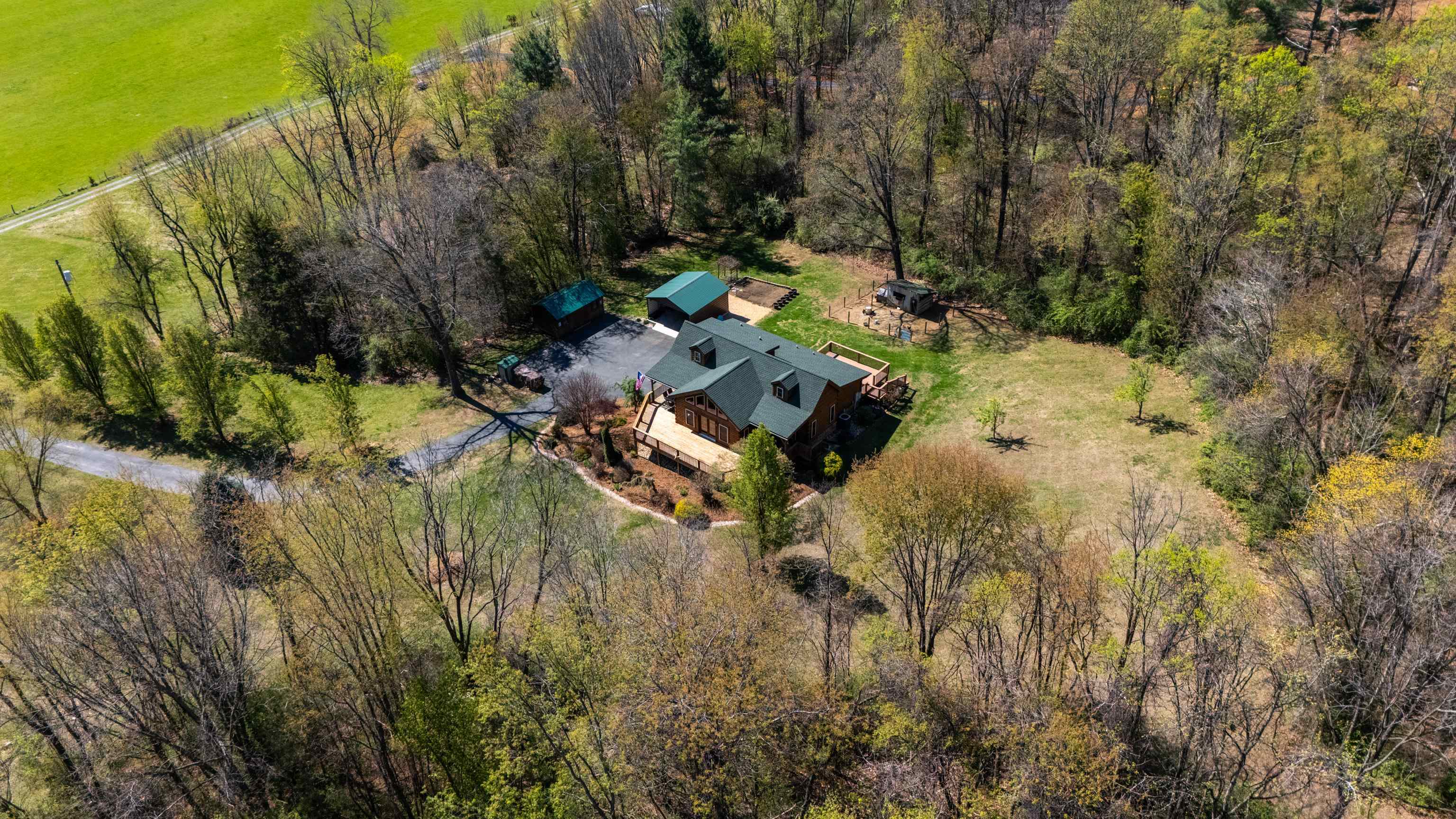115 Spring Crossing Lane Steeles Tavern, VA 24476 - Photo 67 of 74 a aerial view of residential house with outdoor space
