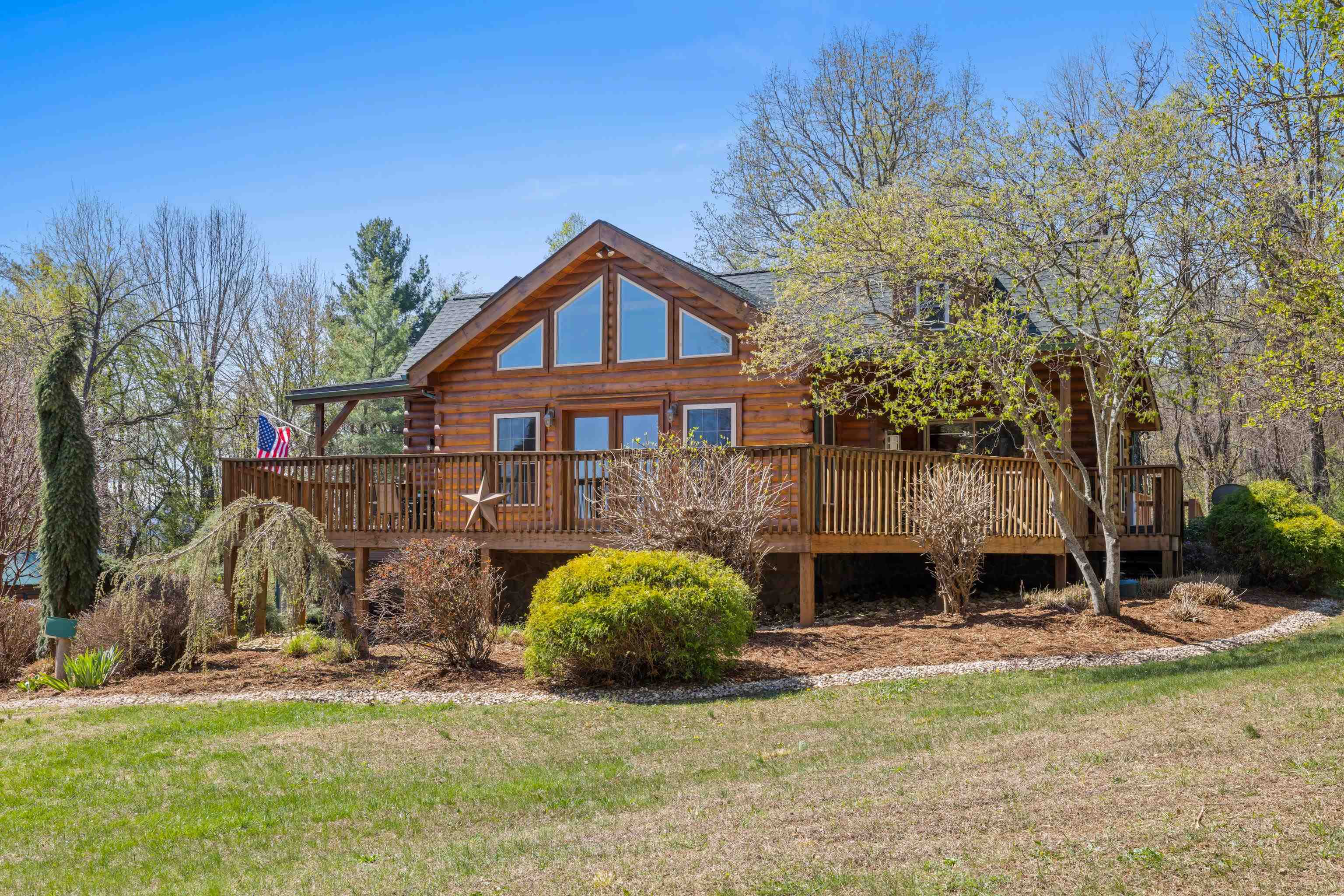 115 Spring Crossing Lane Steeles Tavern, VA 24476 - Photo 10 of 74 a front view of a house with garden