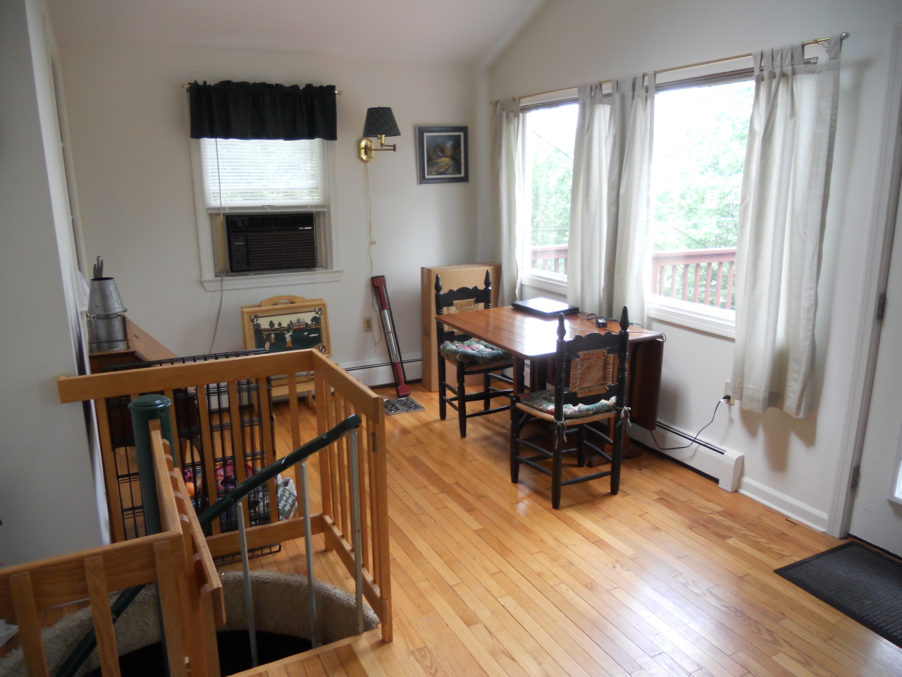 465 Brookman Road Pownal, VT 05261 - Photo 3 of 19 a living room with furniture and a flat screen tv