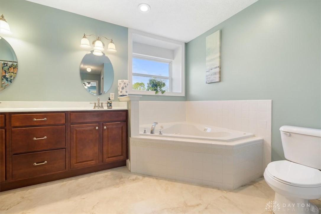 841 Willow Road Springfield, OH 45502 - Photo 20 of 64 This tranquil bathroom provides a large soaking tub and ample counter space for ultimate comfort.