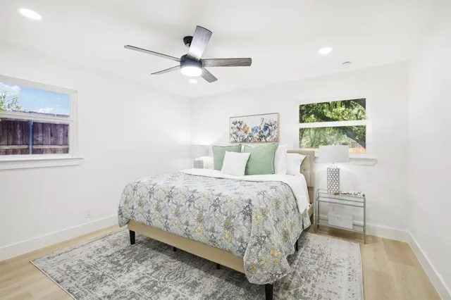 a kitchen with counter top space a sink cabinets and appliances