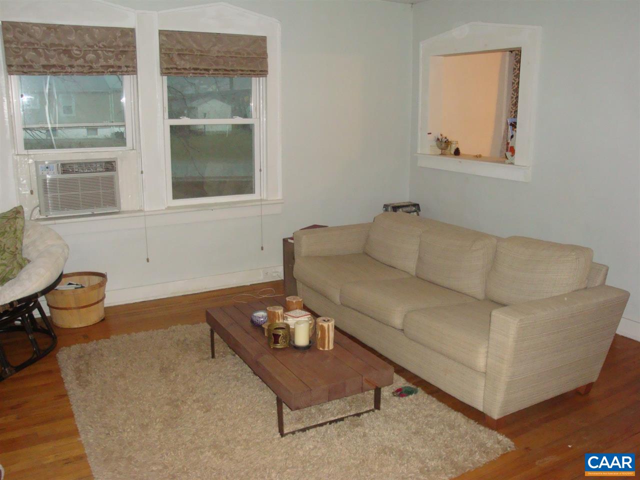 406 Harris Road Charlottesville, VA 22903 - Photo 3 of 13 a living room with furniture and a window