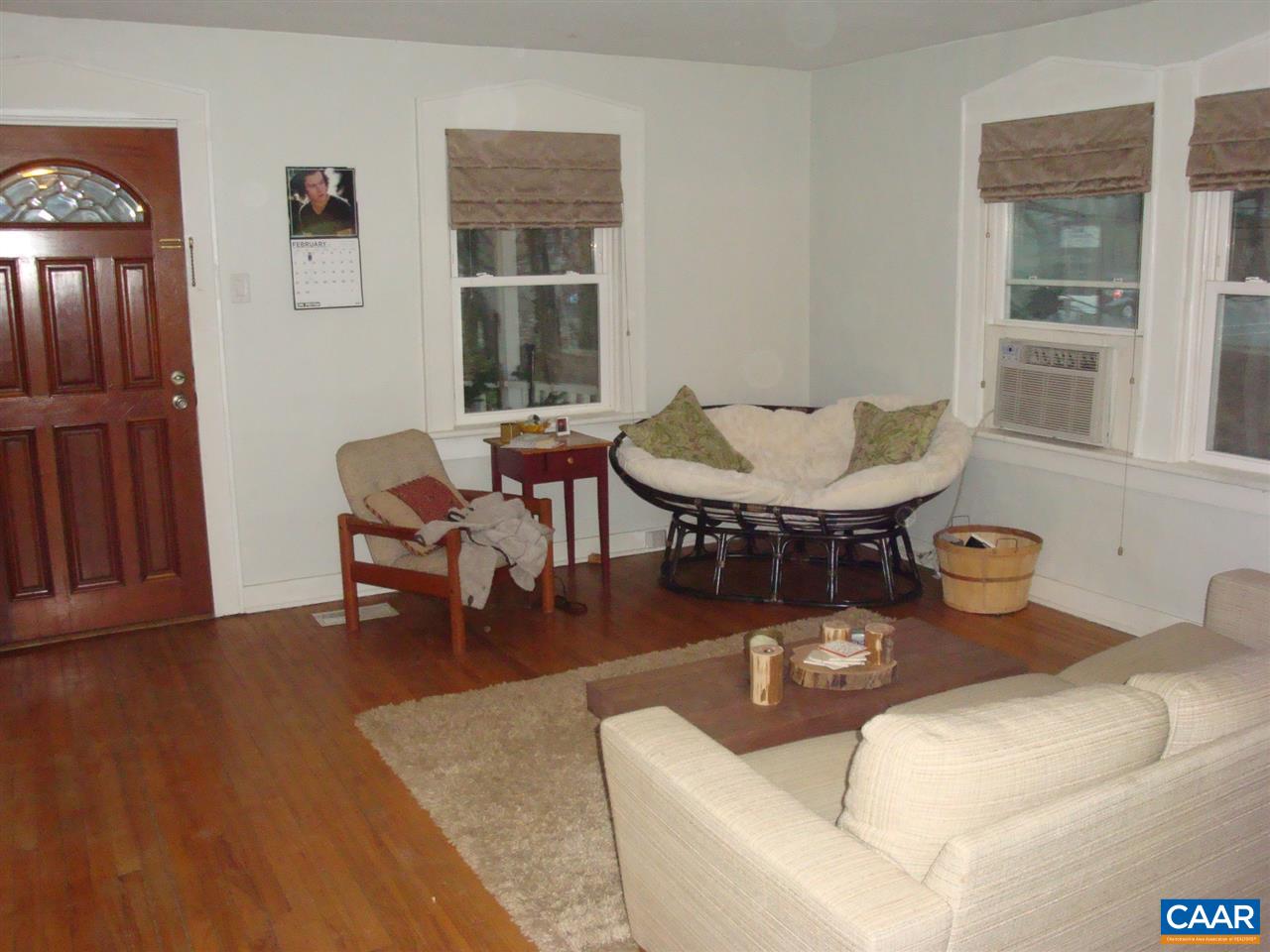 406 Harris Road Charlottesville, VA 22903 - Photo 4 of 13 a living room with furniture a window and a table