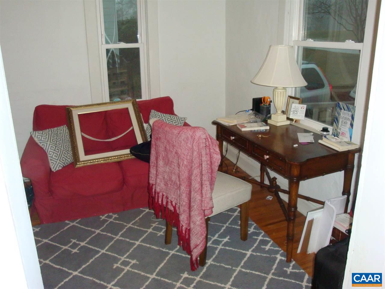 406 Harris Road Charlottesville, VA 22903 - Photo 5 of 13 a view of a room with furniture and a table