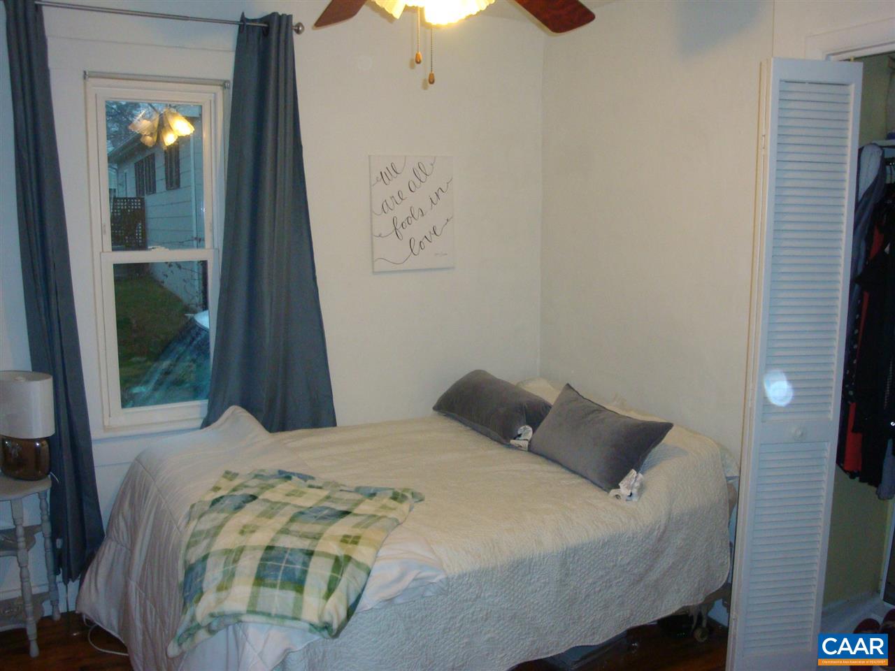 406 Harris Road Charlottesville, VA 22903 - Photo 6 of 13 a bedroom with a bed and a window